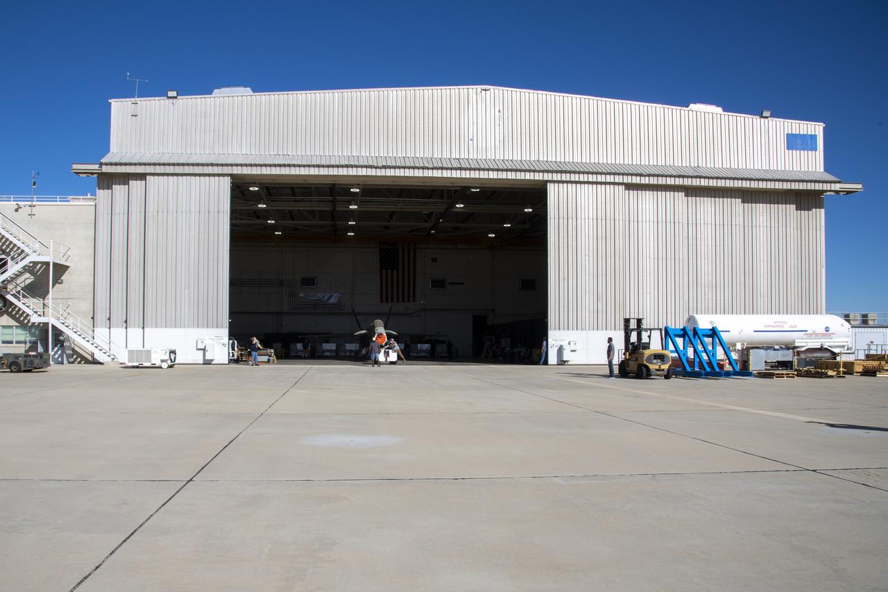An F/A-18E from the Naval Air Systems Command (NAVAIR) in Patuxent River, Maryland, is moved from NASAâ€™s Armstrong Flight Research Center Flight Loads Laboratory in Edwards, California, to a hangar where it will undergo final preparations to return to its squadron. The aircraft underwent the centerâ€™s biggest load calibrations tests. The testing will permit the aircraft to serve as a test vehicle to determine if it can safely manage maneuvers and proposed upgrades.