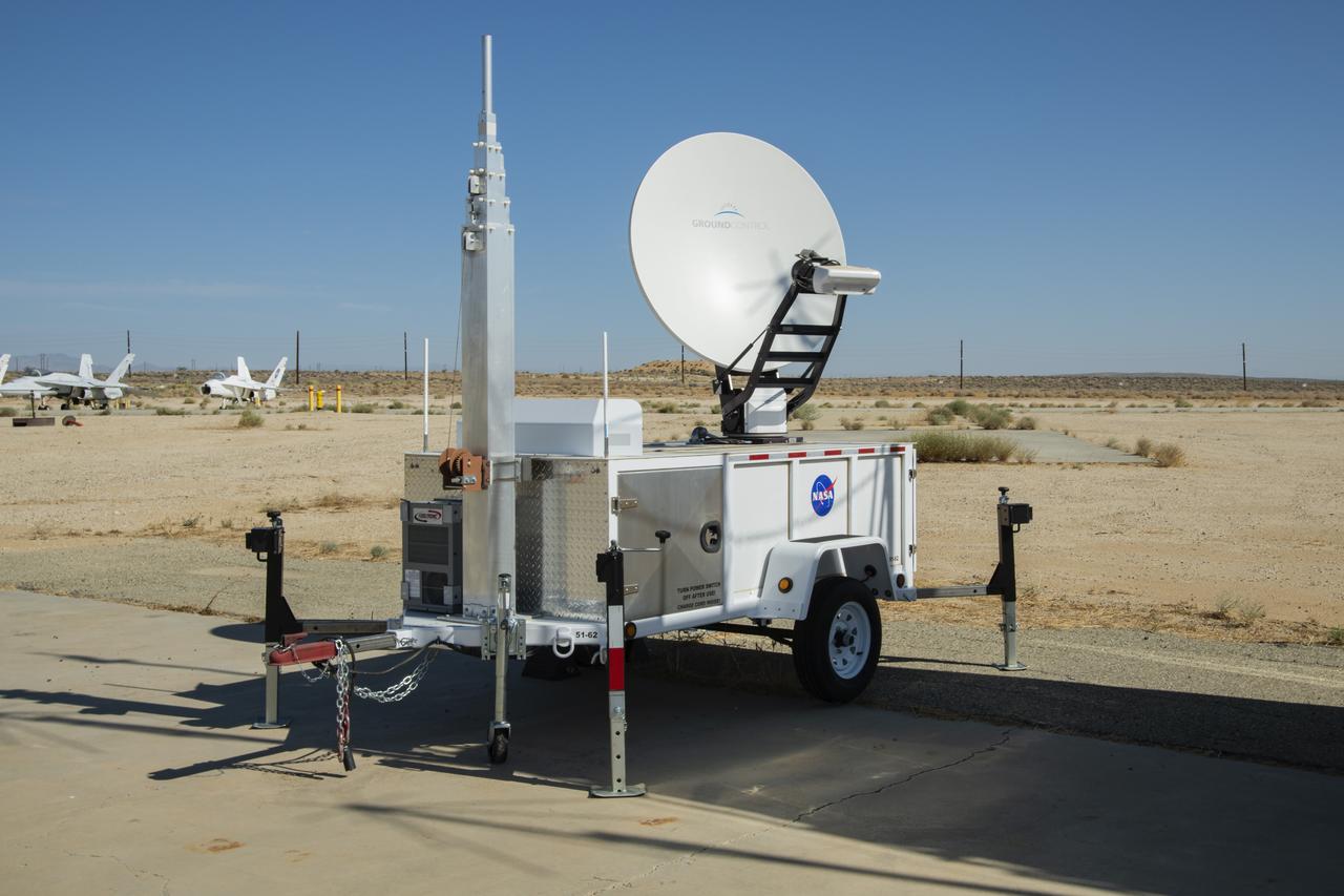 NASA Advanced Air Mobility project’s National Campaign mobile testing trailer is pictured at NASA Armstrong Flight Research Center in Edwards California on July 20, 2022. This trailer supports the Mobile Operations Facility’s data transmission when deployed to test locations.