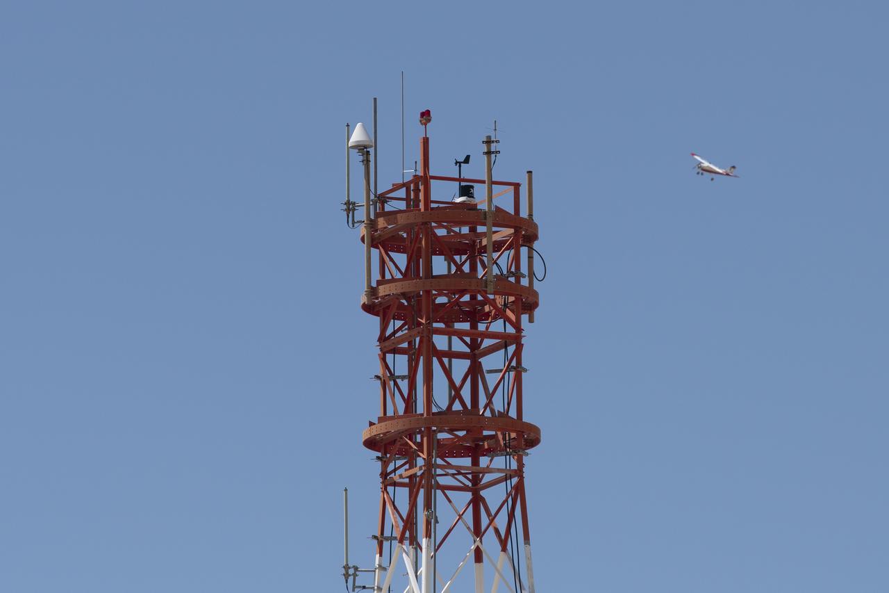 The DROID 2 (Dryden Remotely Operated Integrated Drone 2) flies by a 140-foot instrumented tower at NASA's Armstrong Flight Research Center in Edwards, California, as part of the Advanced Exploration of Reliable Operation at Low Altitudes: Meteorology, Simulation, and Technology campaign. The focus was to study wind to provide data for safe takeoff and landing of future air taxis.