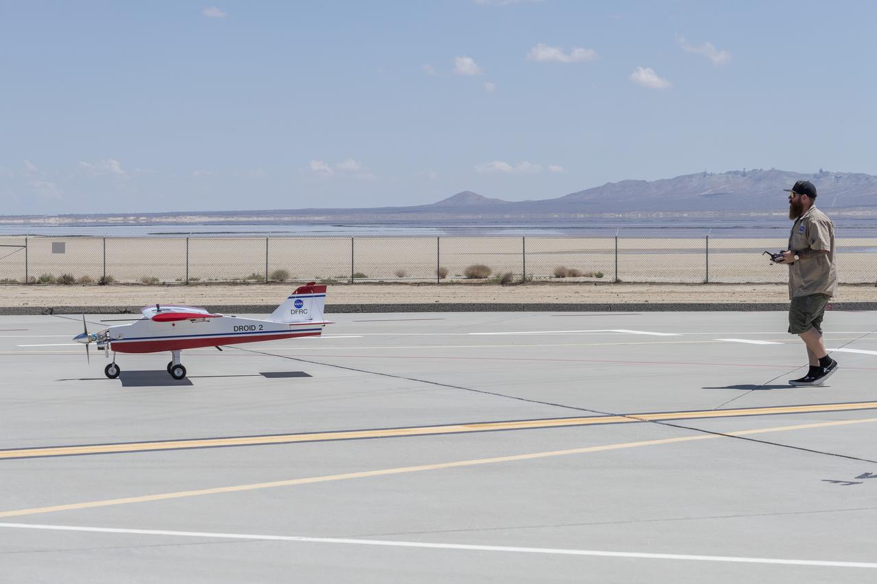 Justin Hall lands the DROID 2 (Dryden Remotely Operated Integrated Drone 2) aircraft at NASA's Armstrong Flight Research Center in Edwards, California, as part of the Advanced Exploration of Reliable Operation at Low Altitudes: Meteorology, Simulation, and Technology campaign. The focus was to study wind to provide data for safe takeoff and landing of future air taxis.
