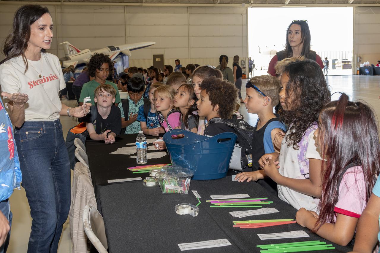 Kate M. McMurtry, deputy director of Integrated Aviation Systems Program shares with students how NASA is working to quiet the sonic boom with the development of the X-59 aircraft at NASA’s California Office of STEM Engagement event with Center of Science and Industry at NASA Armstrong Flight Research Center in Edwards, California.