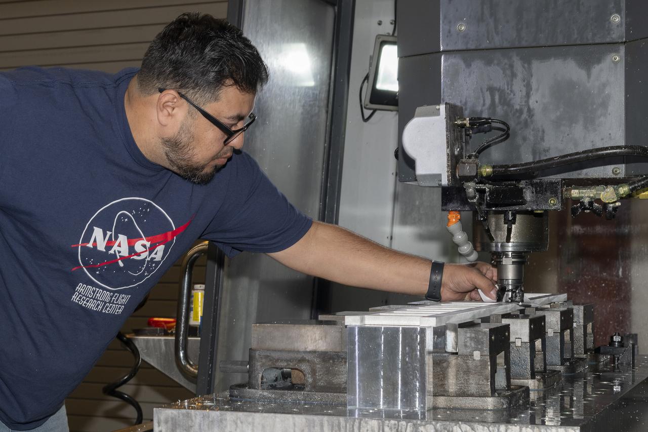 German Escobar works on milling the strut frame assembly for a 10-foot model of the Transonic Truss-Braced Wing at NASA’s Armstrong Flight Research Center, in Edwards, California. The aircraft concept involves a wing braced on an aircraft using diagonal struts that also add lift and could result in significantly improved aerodynamics.