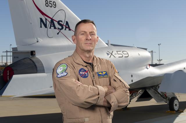 NASA image: NASA Test Pilot Jim Less Poses with X-59 Research Aircraft