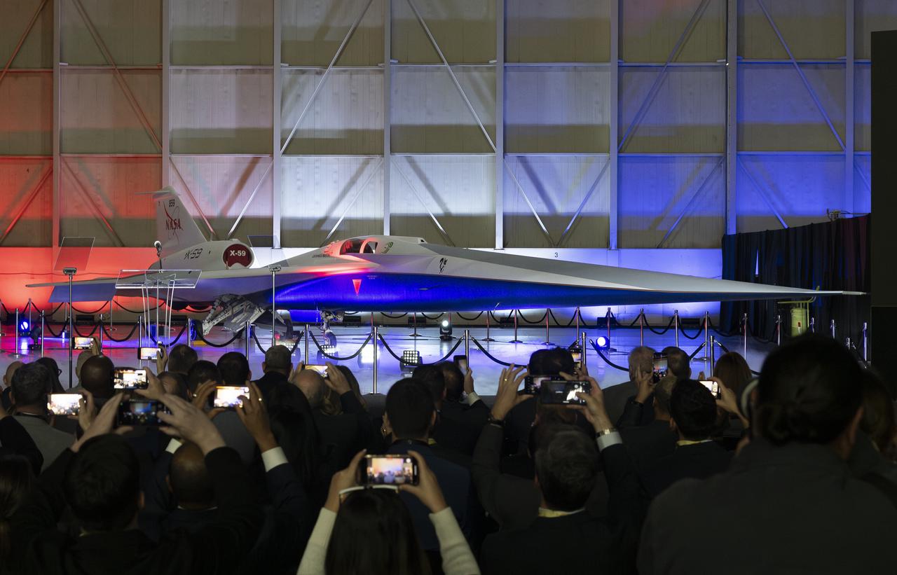 NASA and Lockheed Martin publicly unveil the X-59 quiet supersonic research aircraft at a ceremony in Lockheed Martin’s Skunk Works facility in Palmdale, California. The X-59 is the centerpiece of NASA’s Quesst mission, which seeks to solve one of the major barriers to supersonic flight over land, currently banned in the United States, by making sonic booms quieter.
