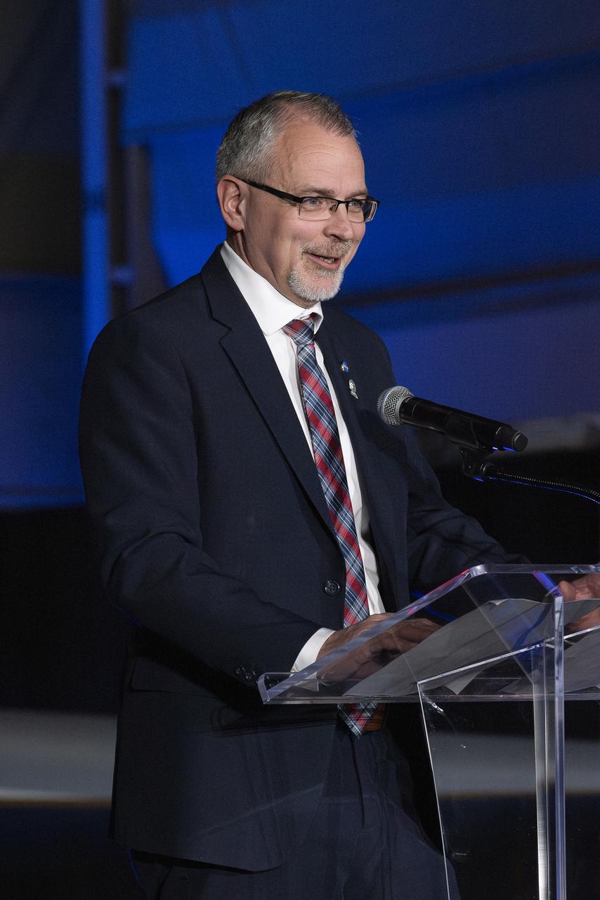 NASA Associate Administrator Jim Free speaks on stage following the unveiling of the agency’s X-59 quiet supersonic research aircraft at a January 12, 2024 event at Lockheed Martin Skunk Works in Palmdale, California. The X-59 is the centerpiece of NASA’s Quesst mission, which seeks to solve one of the major barriers to supersonic flight over land, currently banned in the United States, by making sonic booms quieter.