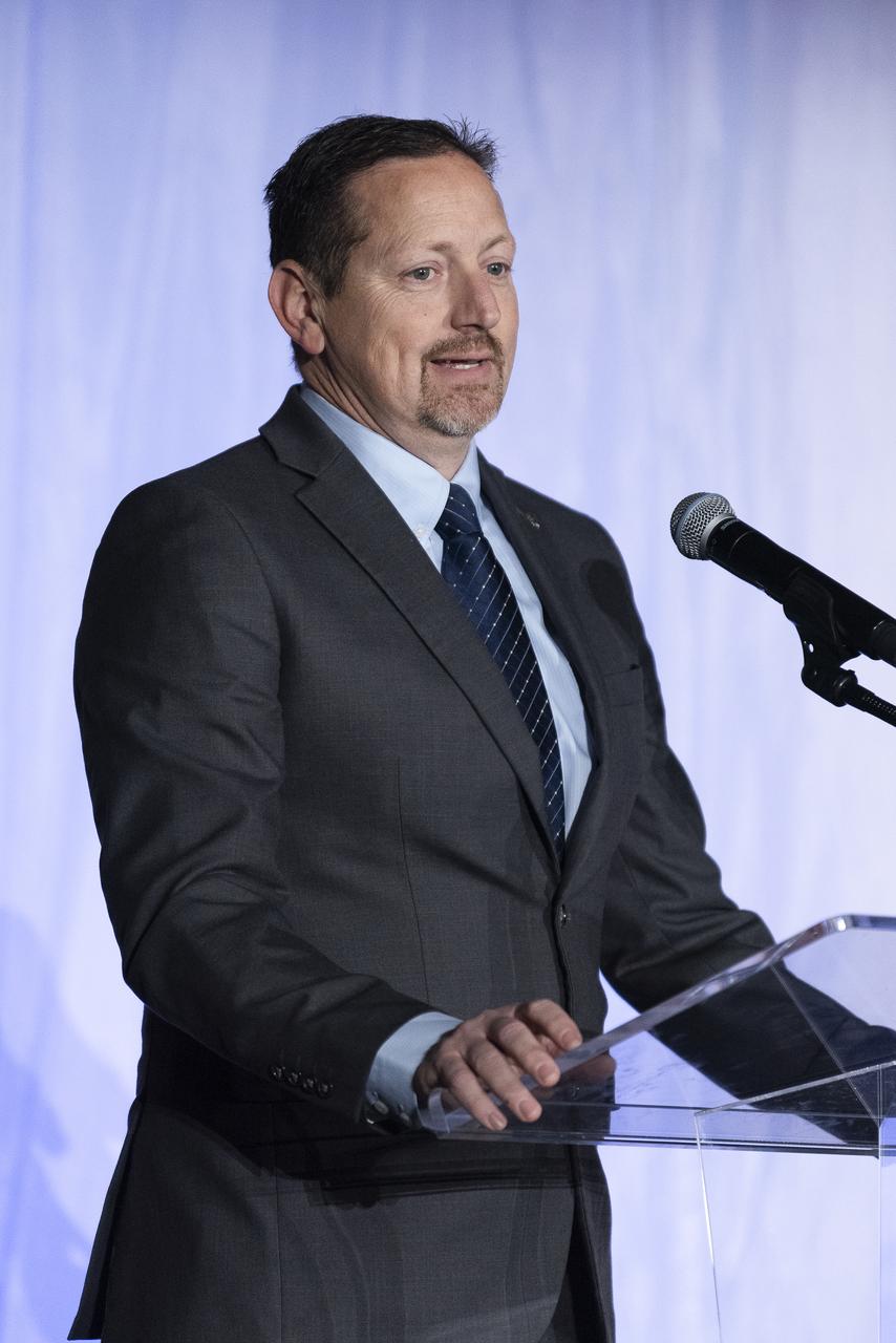 Lockheed Martin Skunk Works Vice President and General Manager John Clark speaks on stage prior to the unveiling of the agency’s X-59 quiet supersonic research aircraft at a January 12, 2024 event at Lockheed Martin Skunk Works in Palmdale, California. The X-59 is the centerpiece of NASA’s Quesst mission, which seeks to solve one of the major barriers to supersonic flight over land, currently banned in the United States, by making sonic booms quieter.