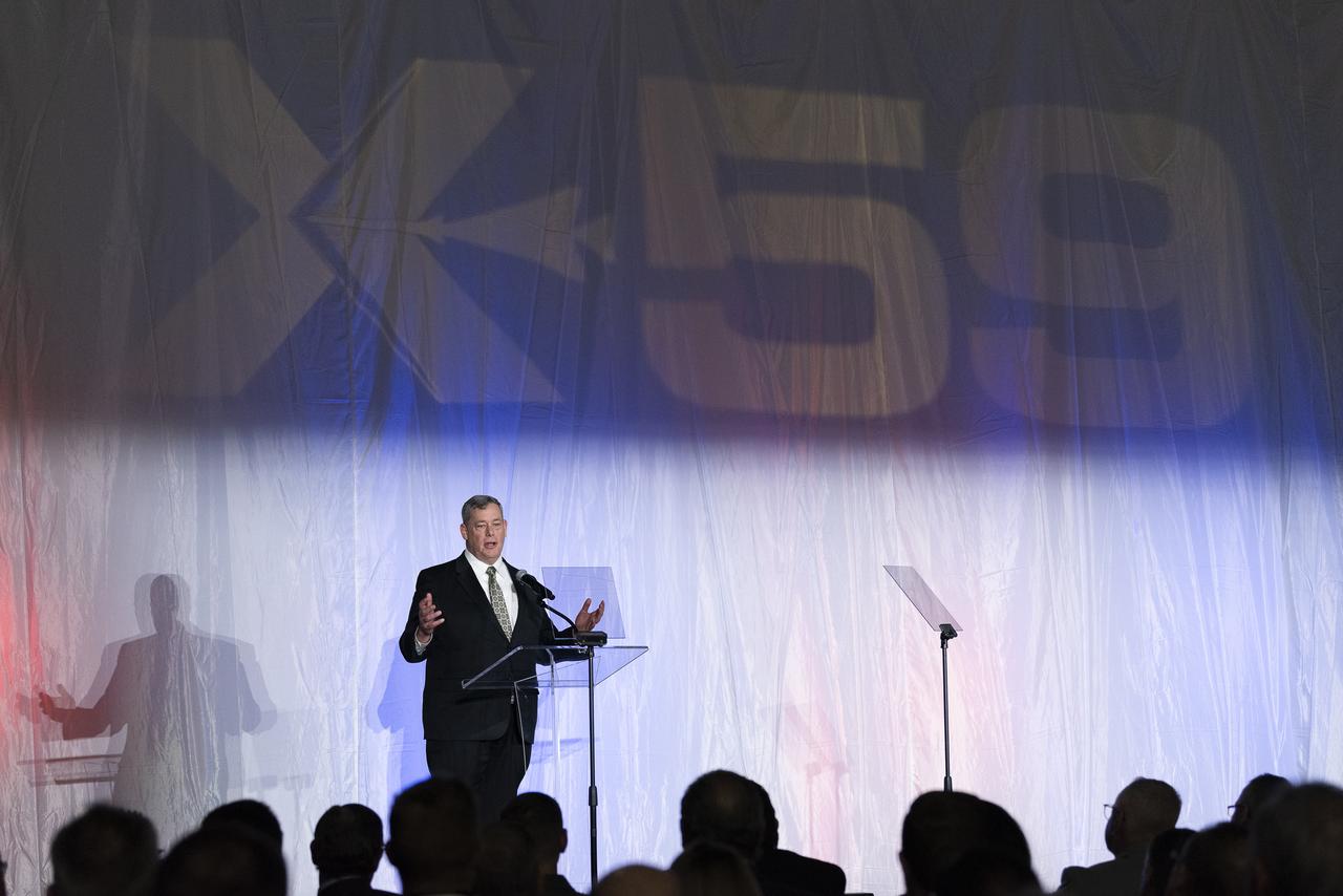 Lockheed Martin Aeronautics Executive Vice President Greg Ulmer speaks on stage prior to the unveiling of the agency’s X-59 quiet supersonic research aircraft at a January 12, 2024 event at Lockheed Martin Skunk Works in Palmdale, California. The X-59 is the centerpiece of NASA’s Quesst mission, which seeks to solve one of the major barriers to supersonic flight over land, currently banned in the United States, by making sonic booms quieter.