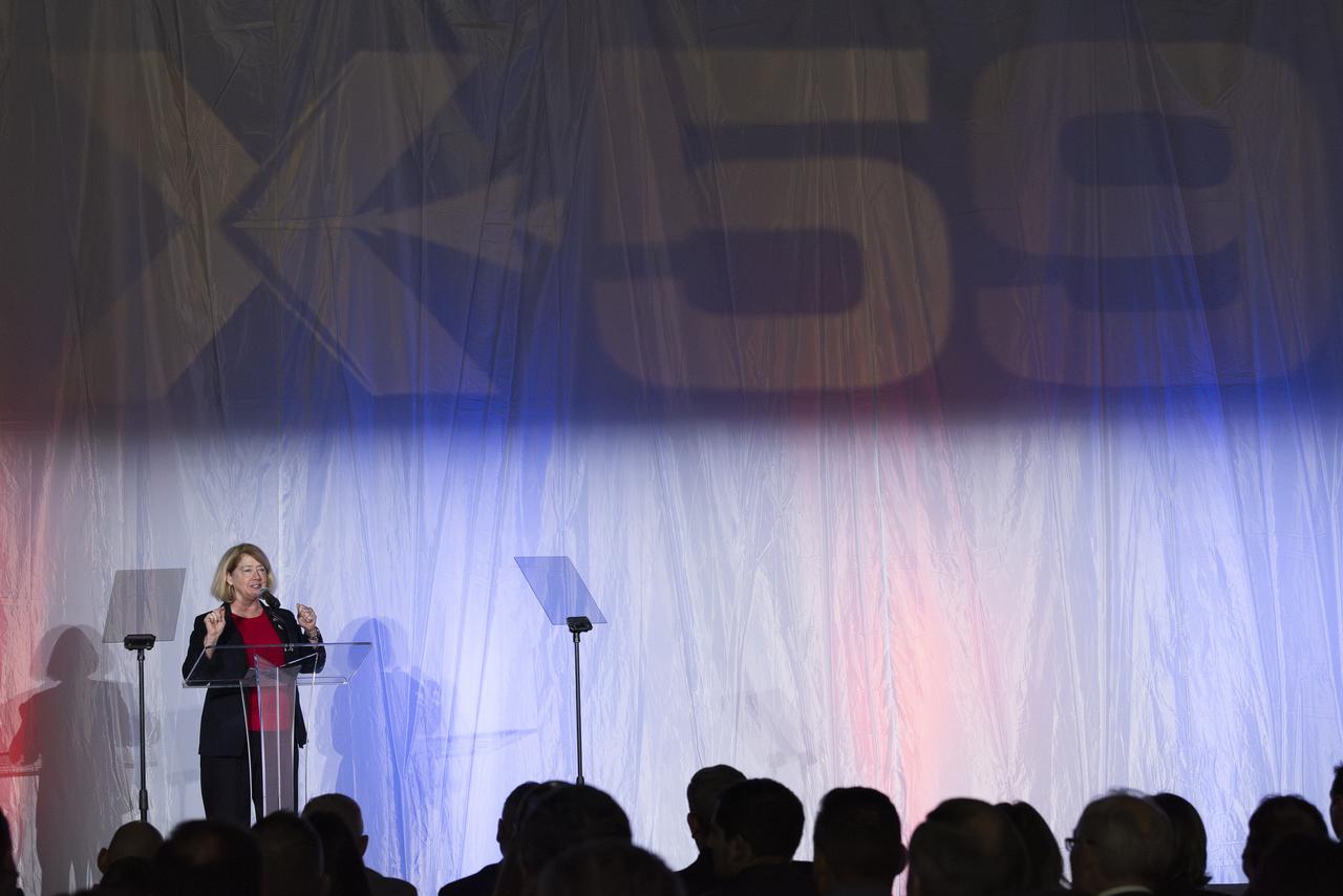 NASA Deputy Administrator Pam Melroy speaks on stage prior to the official unveiling of the agency’s X-59 quiet supersonic research aircraft at a January 12, 2024 event at Lockheed Martin Skunk Works in Palmdale, California. The X-59 is the centerpiece of NASA’s Quesst mission, which seeks to solve one of the major barriers to supersonic flight over land, currently banned in the United States, by making sonic booms quieter.