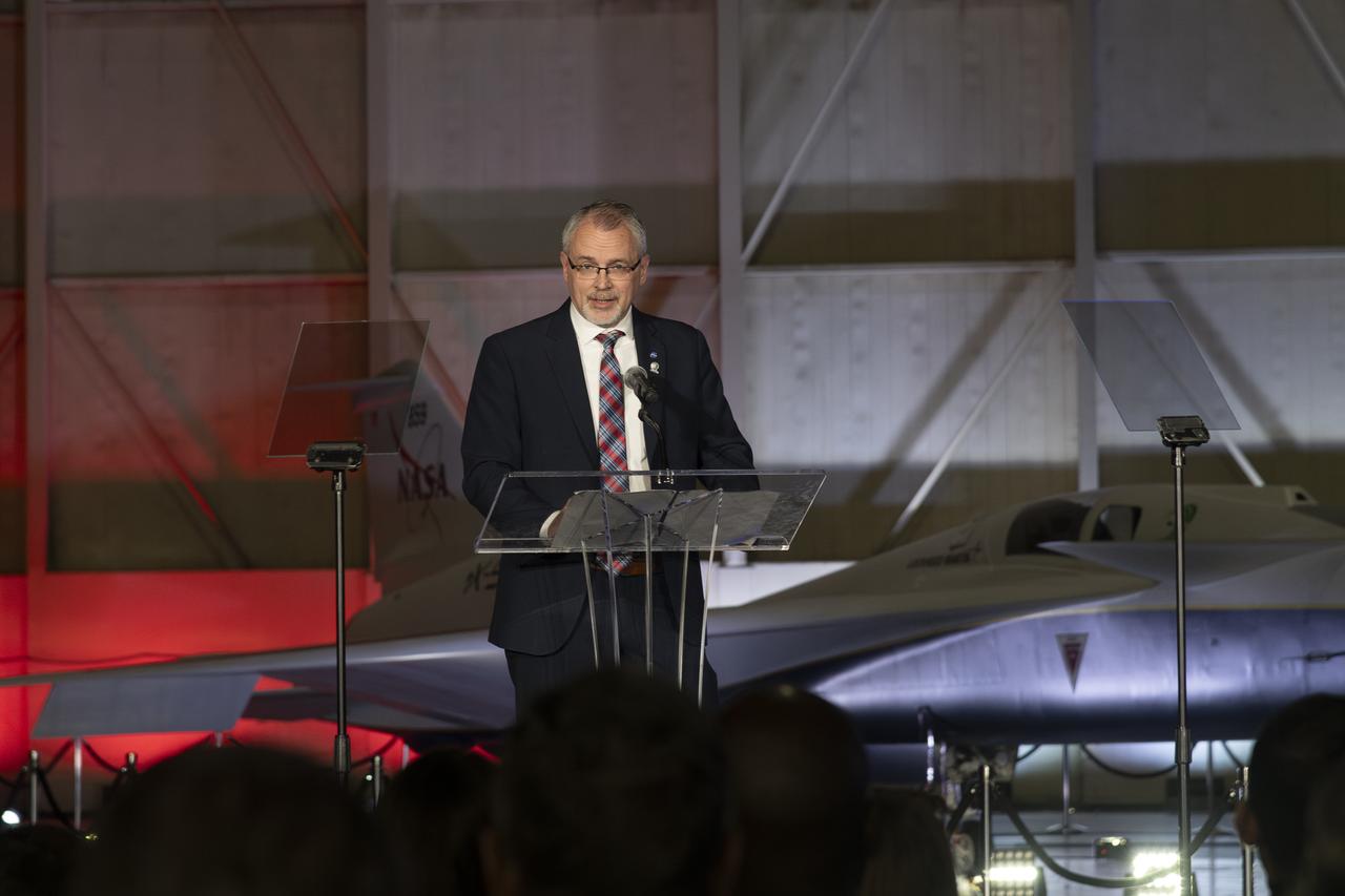 NASA Associate Administrator Jim Free speaks on stage following the unveiling of the agency’s X-59 quiet supersonic research aircraft at a January 12, 2024 event at Lockheed Martin Skunk Works in Palmdale, California. The X-59 is the centerpiece of NASA’s Quesst mission, which seeks to solve one of the major barriers to supersonic flight over land, currently banned in the United States, by making sonic booms quieter.