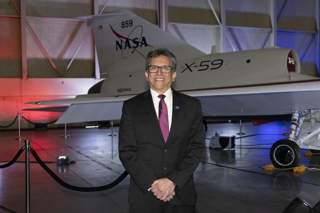 NASA image: NASA Engineer Poses in Front of Unveiled X-59