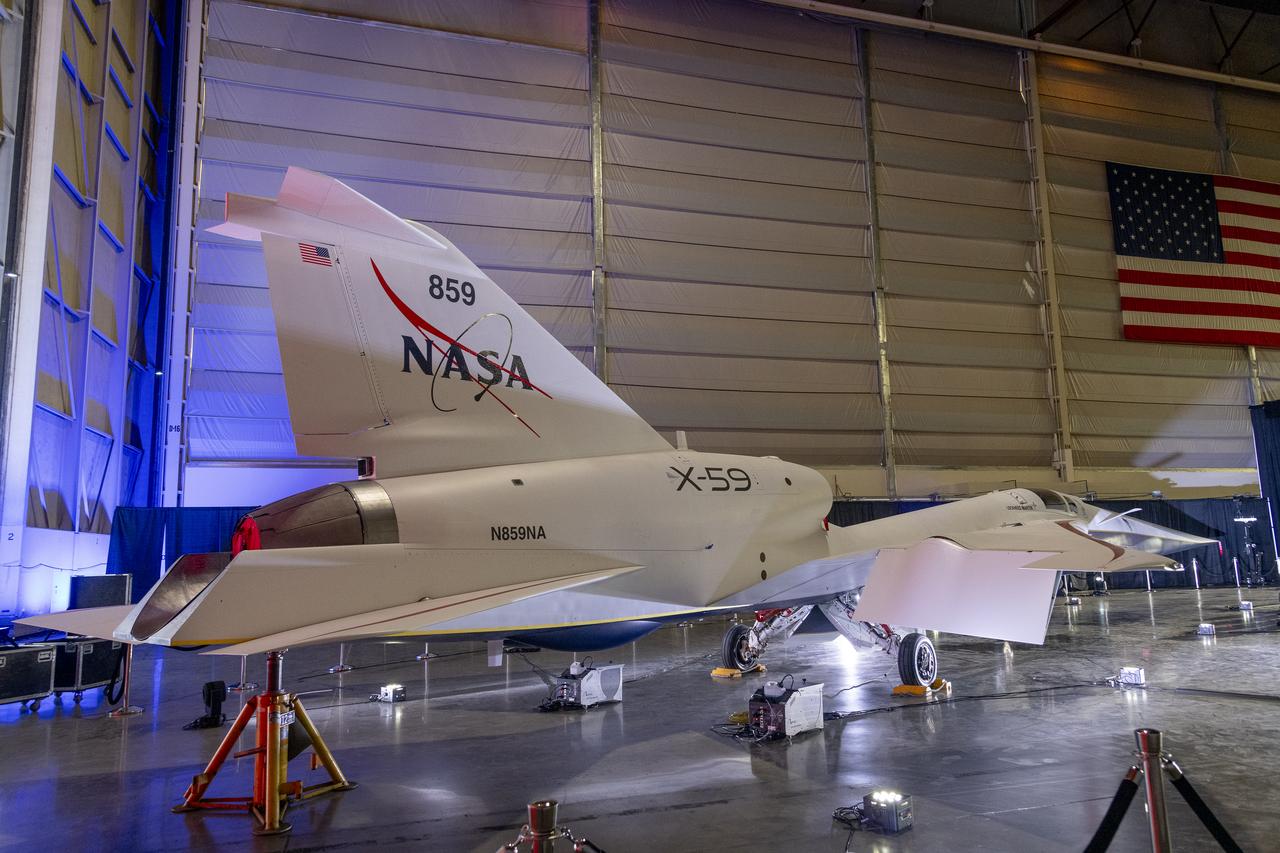NASA’s X-59 quiet supersonic research aircraft sits in position inside a hangar at Lockheed Martin Skunk Works in Palmdale, California prior to its January 12, 2024 unveiling. The X-59 is the centerpiece of NASA’s Quesst mission, which seeks to solve one of the major barriers to supersonic flight over land, currently banned in the United States, by making sonic booms quieter.