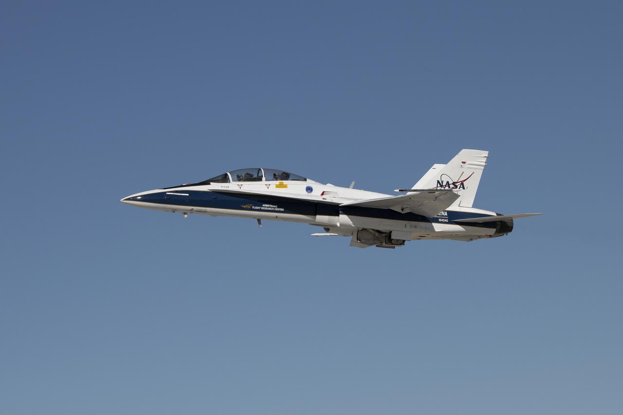 The Quesst mission recently completed testing of operations and equipment to be used in recording the sonic thumps of the X-59. To simulate the sonic thumps expected to be created by the X-59, NASA Armstrong Flight Researcher Center pilot Jim Less performed inverted dive maneuvers in an F-18, shown here, to generate softer sonic booms. The sonic booms were recorded by 10 ground recording stations stretched across 30 miles of desert near Edwards Air Force Base.