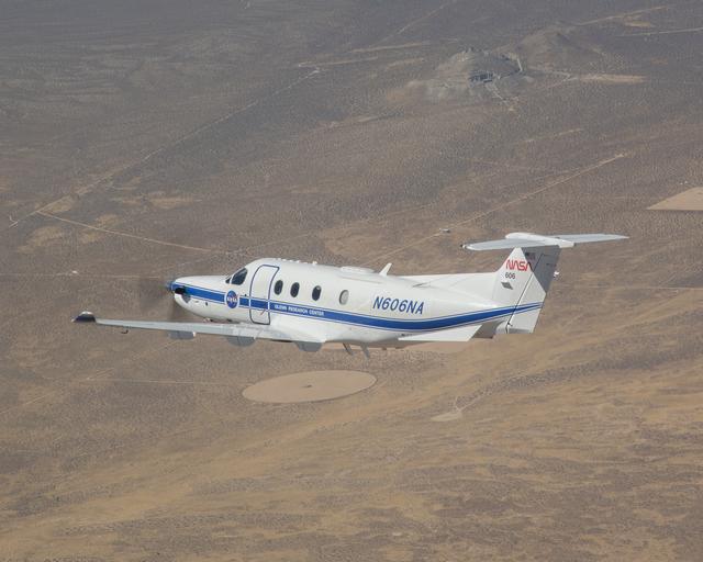 The Mojave Desert serves as a stark background for NASA’s Pilatus PC-12 flying near Armstrong Flight Research Center in Edwards, California on Sept. 18, 2024.