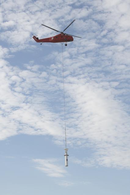 NASA image: Helicopter Removes Historic Rooftop Pedestal