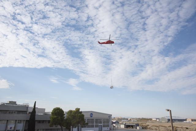 NASA image: Helicopter Removes Historic Rooftop Pedestal