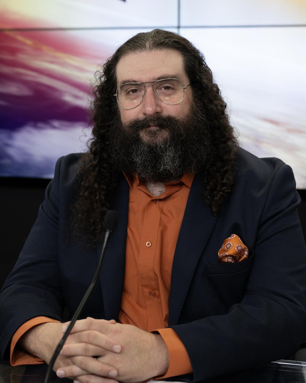 Phil Korngut, SPHEREx instrument scientist, Caltech, participates in a science briefing on Tuesday, Feb. 25, 2025, to discuss the upcoming launch of NASA’s SPHEREx (Spectro-Photometer for the History of the Universe, Epoch of Reionization and Ices Explorer) observatory and PUNCH (Polarimeter to Unify the Corona and Heliosphere) satellites at Vandenberg Space Force Base in California. SPHEREx will use its telescope to provide an all-sky spectral survey, creating a 3D map of the entire sky to help scientists investigate the origins of our universe. PUNCH will study origins of the Sun’s outflow of material, or the solar wind, capturing continuous 3D images of the Sun’s corona and the solar wind’s journey into the solar system. 