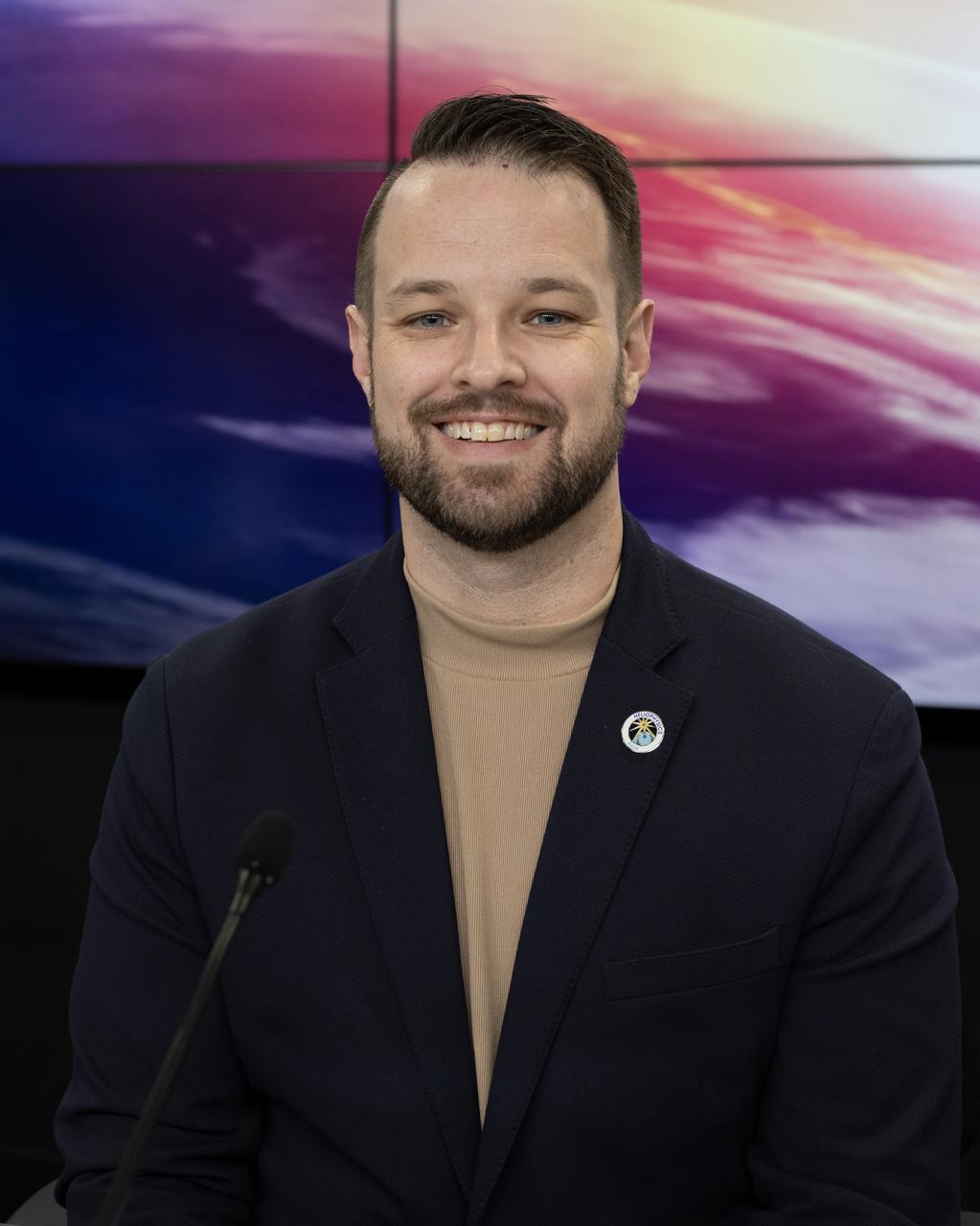 Joe Westlake, director, Heliophysics Division, NASA Headquarters, participates in a science briefing on Tuesday, Feb. 25, 2025, to discuss the upcoming launch of NASA’s SPHEREx (Spectro-Photometer for the History of the Universe, Epoch of Reionization and Ices Explorer) observatory and PUNCH (Polarimeter to Unify the Corona and Heliosphere) satellites at Vandenberg Space Force Base in California. SPHEREx will use its telescope to provide an all-sky spectral survey, creating a 3D map of the entire sky to help scientists investigate the origins of our universe. PUNCH will study origins of the Sun’s outflow of material, or the solar wind, capturing continuous 3D images of the Sun’s corona and the solar wind’s journey into the solar system. 