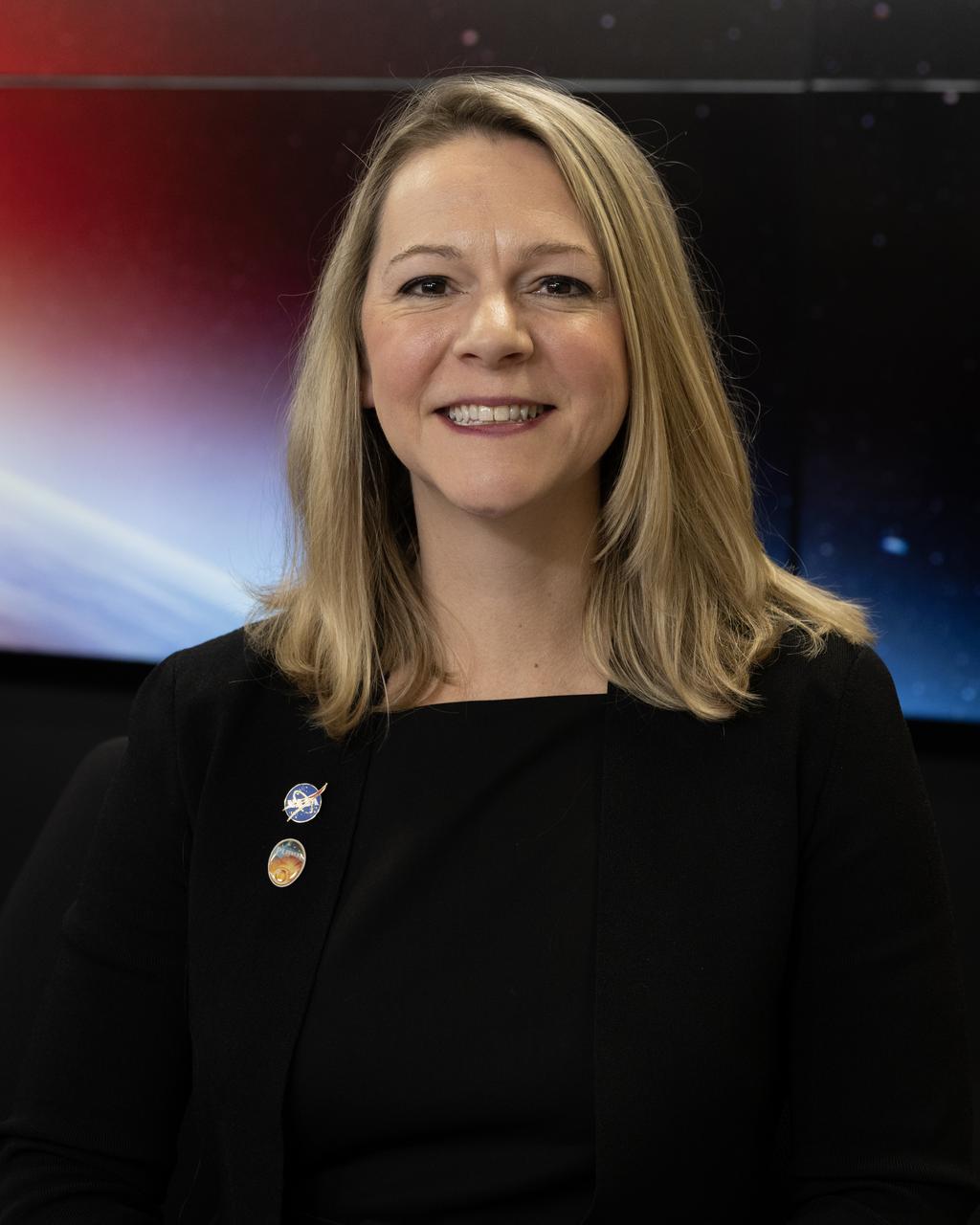 Nicholeen Viall, PUNCH Mission Scientist, NASA’s Goddard Flight Center, participates in a science briefing on Tuesday, Feb. 25, 2025, to discuss the upcoming launch of NASA’s SPHEREx (Spectro-Photometer for the History of the Universe, Epoch of Reionization and Ices Explorer) observatory and PUNCH (Polarimeter to Unify the Corona and Heliosphere) satellites at Vandenberg Space Force Base in California. SPHEREx will use its telescope to provide an all-sky spectral survey, creating a 3D map of the entire sky to help scientists investigate the origins of our universe. PUNCH will study origins of the Sun’s outflow of material, or the solar wind, capturing continuous 3D images of the Sun’s corona and the solar wind’s journey into the solar system. 