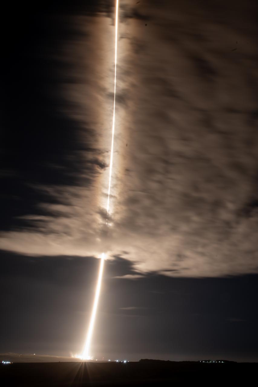 A streak lights up the sky following the launch of NASA’s SPHEREx (Spectro-Photometer for the History of the Universe, Epoch of Reionization and Ices Explorer) observatory and PUNCH (Polarimeter to Unify the Corona and Heliosphere) satellites at Space Launch Complex 4 East from Vandenberg Space Force Base in California on Tuesday, March 11, 2025. SPHEREx will use its telescope to provide an all-sky spectral survey, creating a 3D map of the entire sky to help scientists investigate the origins of our universe. PUNCH will study origins of the Sun’s outflow of material, or the solar wind, capturing continuous 3D images of the Sun’s corona and the solar wind’s journey into the solar system. 