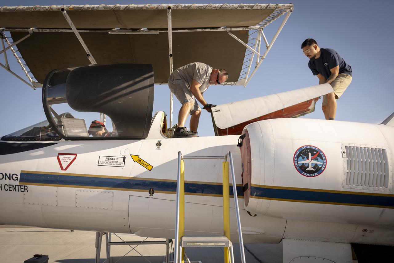 Ground crew members make final preparations on NASA Armstrong Flight Research Center’s ER-2 aircraft at Edwards, California, on Thursday, Aug. 21, 2025, ahead of a high-altitude mission for the Geological Earth Mapping Experiment (GEMx). The pilot will soon board the aircraft, which can fly at altitudes up to 70,000 feet.