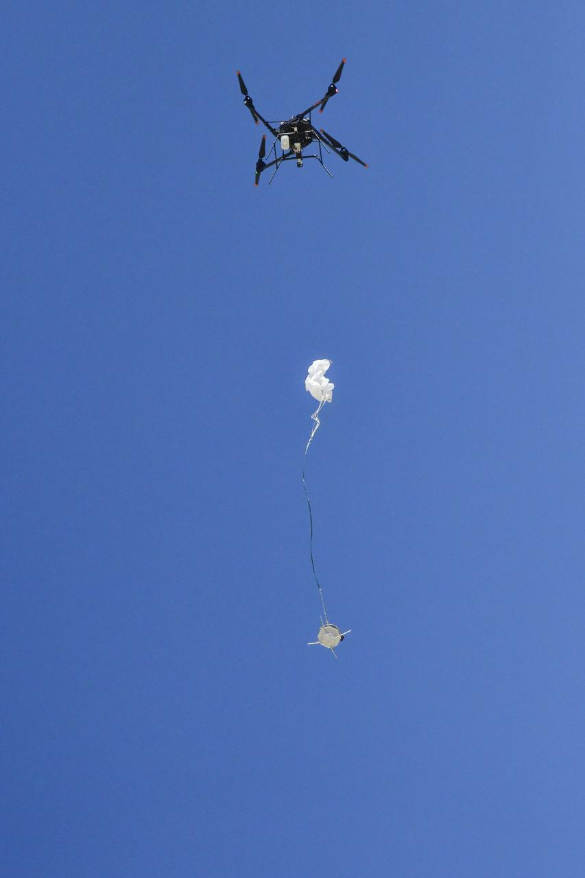 An Alta X drone air launches the Enhancing Parachutes by Instrumenting the Canopy test experiment on June 4, 2025, at NASA’s Armstong Flight Research Center in Edwards, California. NASA researchers are developing technology to make supersonic parachutes safer and more reliable for delivering science instruments and payloads to Mars.