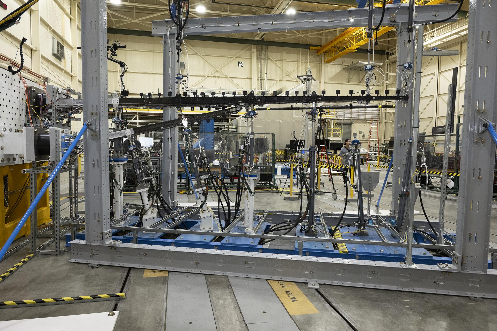 The 15-foot Structural Wing Experiment Evaluating Truss-bracing test article is fully installed in the Flight Loads Laboratory at NASA’s Armstrong Flight Research Center in Edwards, California, on Wednesday, May 20, 2026. The model is part of NASA’s research to develop technologies for future ultra-efficient aircraft.