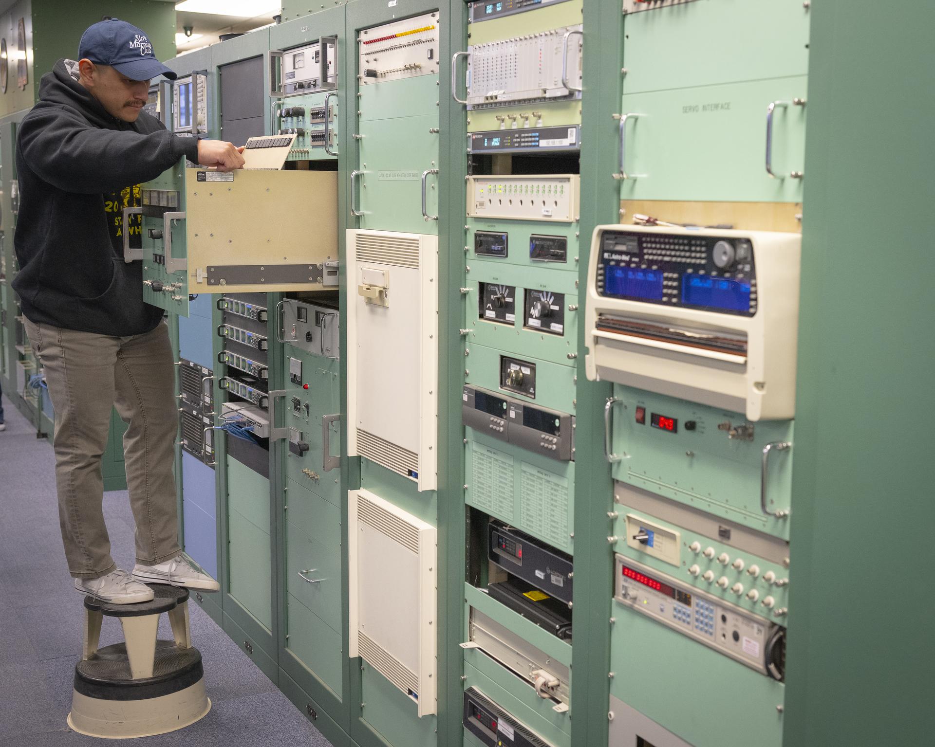 Mission technician Phillips Boche checks on components that support radar tracking at NASA’s Armstrong Flight Research Center in Edwards, California, on Sept. 30, 2025. Boche is part of the center’s Dryden Aeronautical Test Range, which provides voice and tracking support to the International Space Station.