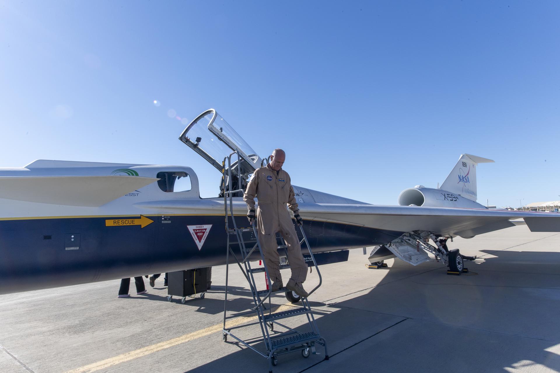 NASA test pilot Nils Larson steps out of the X-59 after successfully completing the aircraft’s first flight Tuesday, Oct. 28, 2025. The mission marked a key milestone in advancing NASA’s Quesst mission to enable quiet supersonic flight over land.