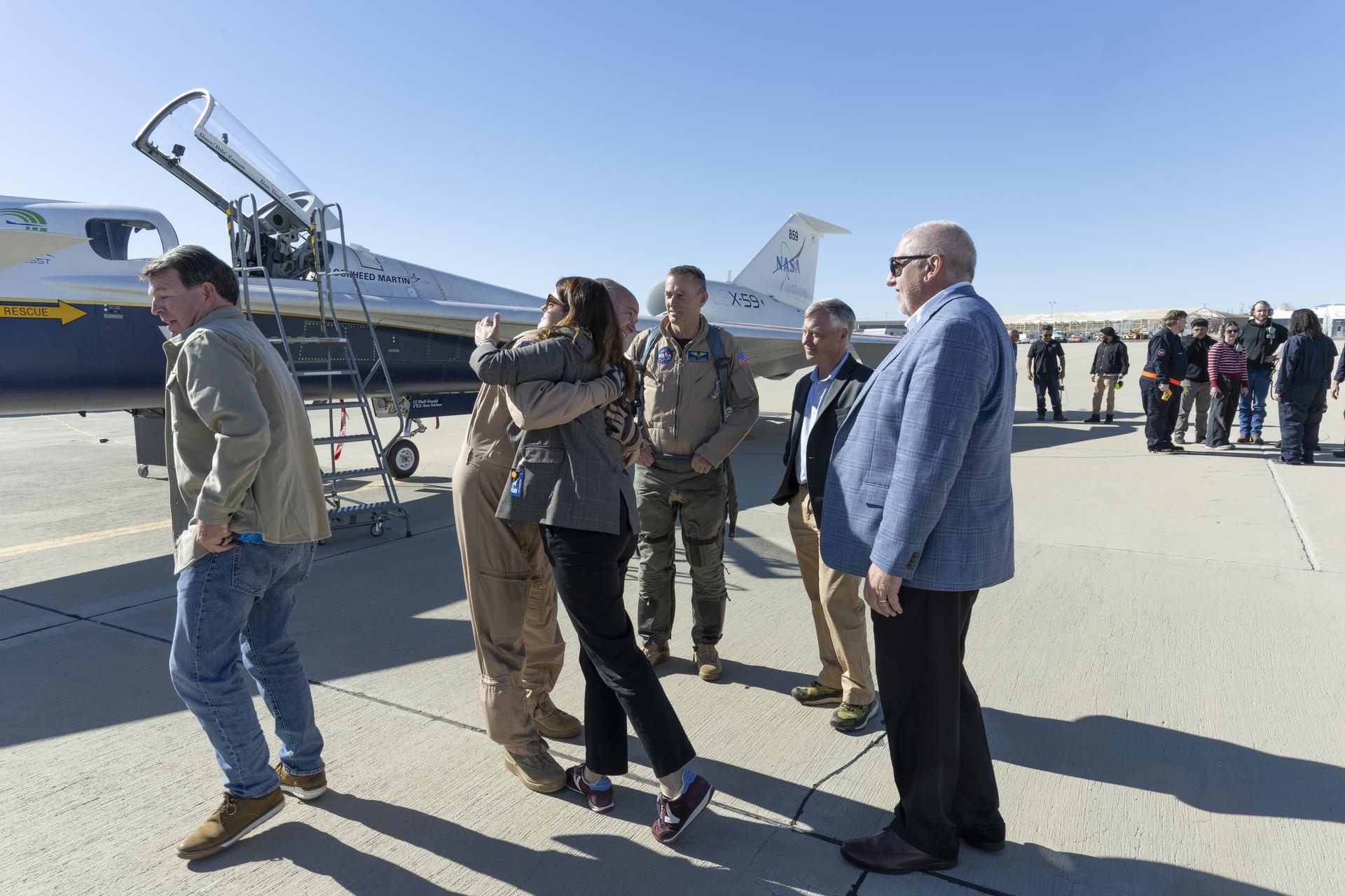 NASA leadership, ground crew, and support personnel gather to congratulate test pilot Nils Larson following his first flight of the X-59 on Tuesday, Oct. 28, 2025. The moment captures years of design, integration, and ground testing and marks the beginning of a new chapter in NASA’s aeronautics research legacy.