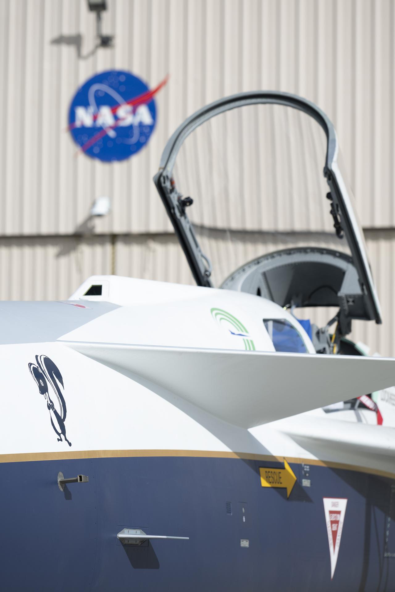 NASA’s X-59 quiet supersonic research aircraft sits outside Hangar 4826 at NASA’s Armstrong Flight Research Center in Edwards, California, on Nov. 19, 2025. The aircraft’s arrival at NASA Armstrong on Oct. 28, 2025, marked its transition into flight operations in support of NASA’s Quesst mission to gather data on quiet supersonic flight.