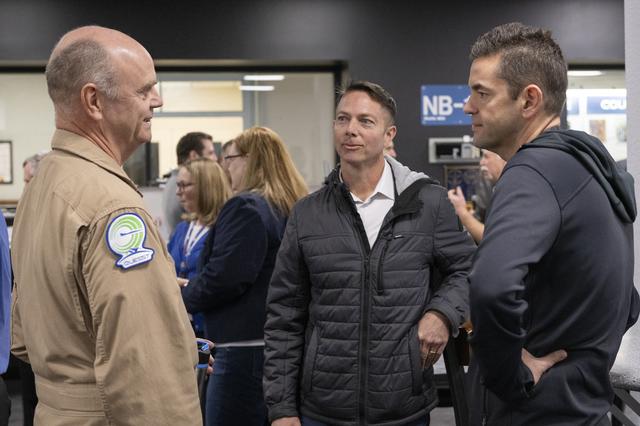 NASA image: NASA Administrator Jared Isaacman, right, speaks with Armstrong X-59 pilot Nils Larson, left, and Technology Transfer Officer Benjamin Tomlinson during Isaacman’s visit to NASA’s Armstrong Flight Research Center in Edwards, California, on Sunday, Jan.