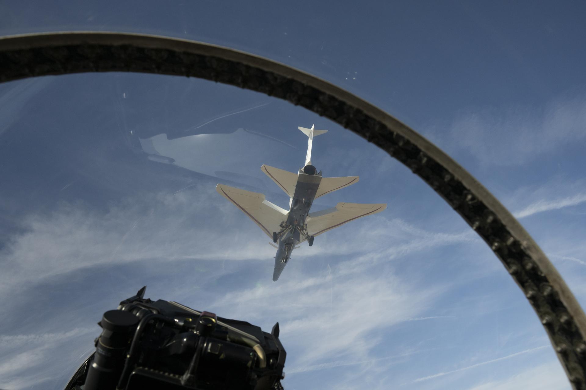 NASA’s X-59 quiet supersonic jet flies over the Mojave Desert during its third flight on Thursday, March 26, 2026, from NASA’s Armstrong Flight Research Center in Edwards, California. The aircraft departed and landed at Edwards Air Force Base, completing its approximate one-hour flight and providing the team with significant data for future flights.