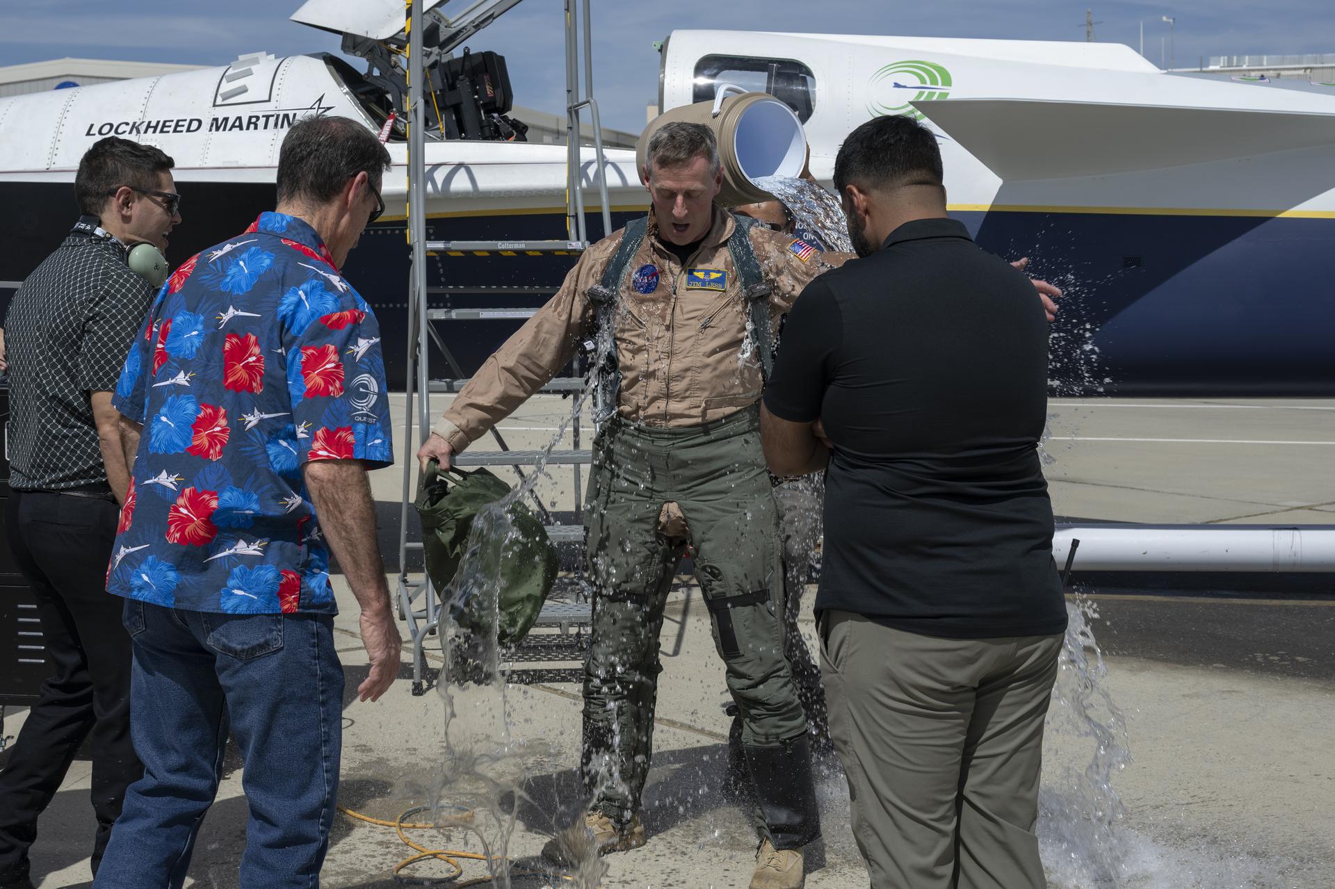 NASA test pilot Jim “Clue” Less is seen after completing his first flight of the X-59 and the aircraft’s second flight overall at Edwards Air Force Base in California on Thursday, March 26, 2026. The flight supports NASA’s Quesst mission to demonstrate supersonic flight that produces a quieter sonic “thump” instead of a loud sonic boom.
