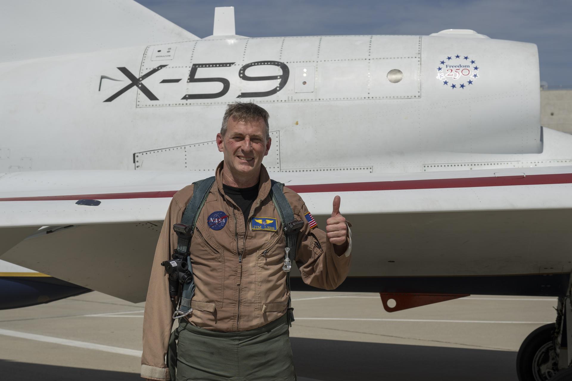 NASA test pilot Jim “Clue” Less is seen after completing his first flight of the X-59 and the aircraft’s second flight overall at Edwards Air Force Base in California on Thursday, March 26, 2026. The flight supports NASA’s Quesst mission to demonstrate supersonic flight that produces a quieter sonic “thump” instead of a loud sonic boom.