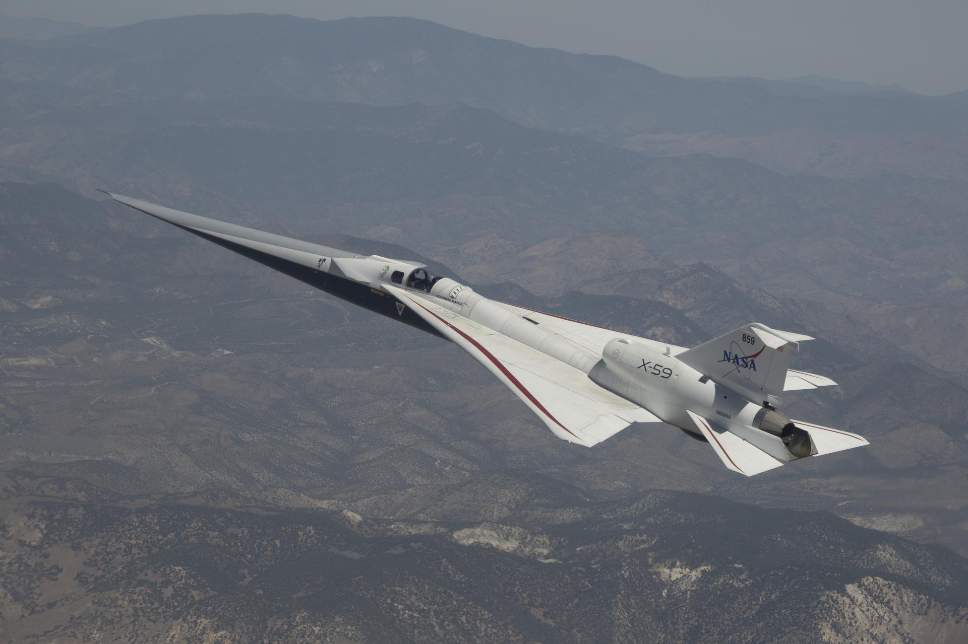  NASA’s X-59 quiet supersonic research aircraft flies above mountains near NASA’s Armstrong Flight Research Center in Edwards, California, on Tuesday, May 12, 2026. NASA continues expanding the aircraft’s flight envelope to evaluate its performance across a range of flight conditions ahead of flight tests at speeds faster than the speed of sound in support of the agency’s Quesst mission.