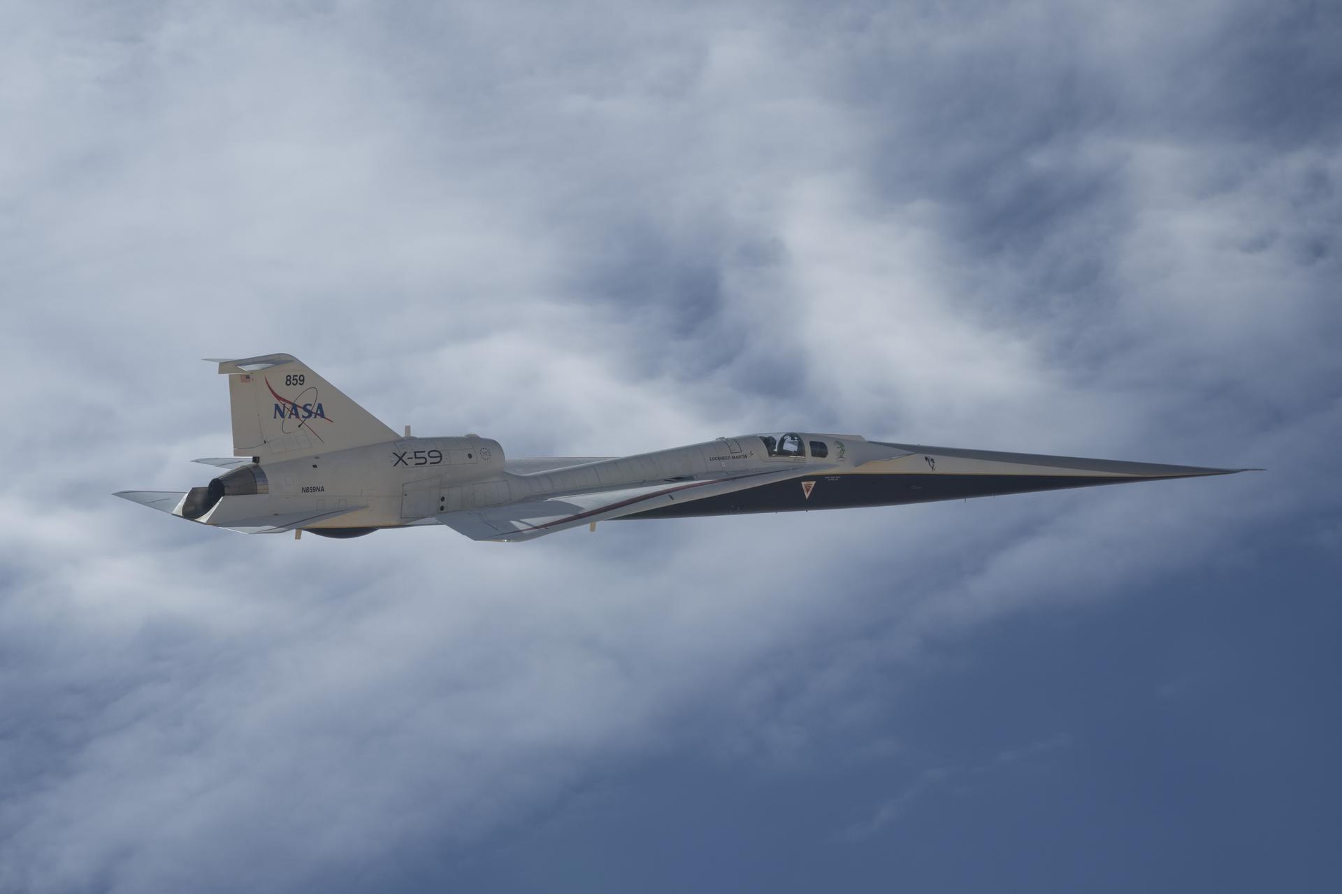 NASA’s X-59 quiet supersonic research aircraft flies near NASA’s Armstrong Flight Research Center in Edwards, California, on Tuesday, May 12, 2026. NASA continues expanding the aircraft’s flight envelope to evaluate its performance across a range of flight conditions ahead of flight tests at speeds faster than the speed of sound in support of the agency’s Quesst mission.