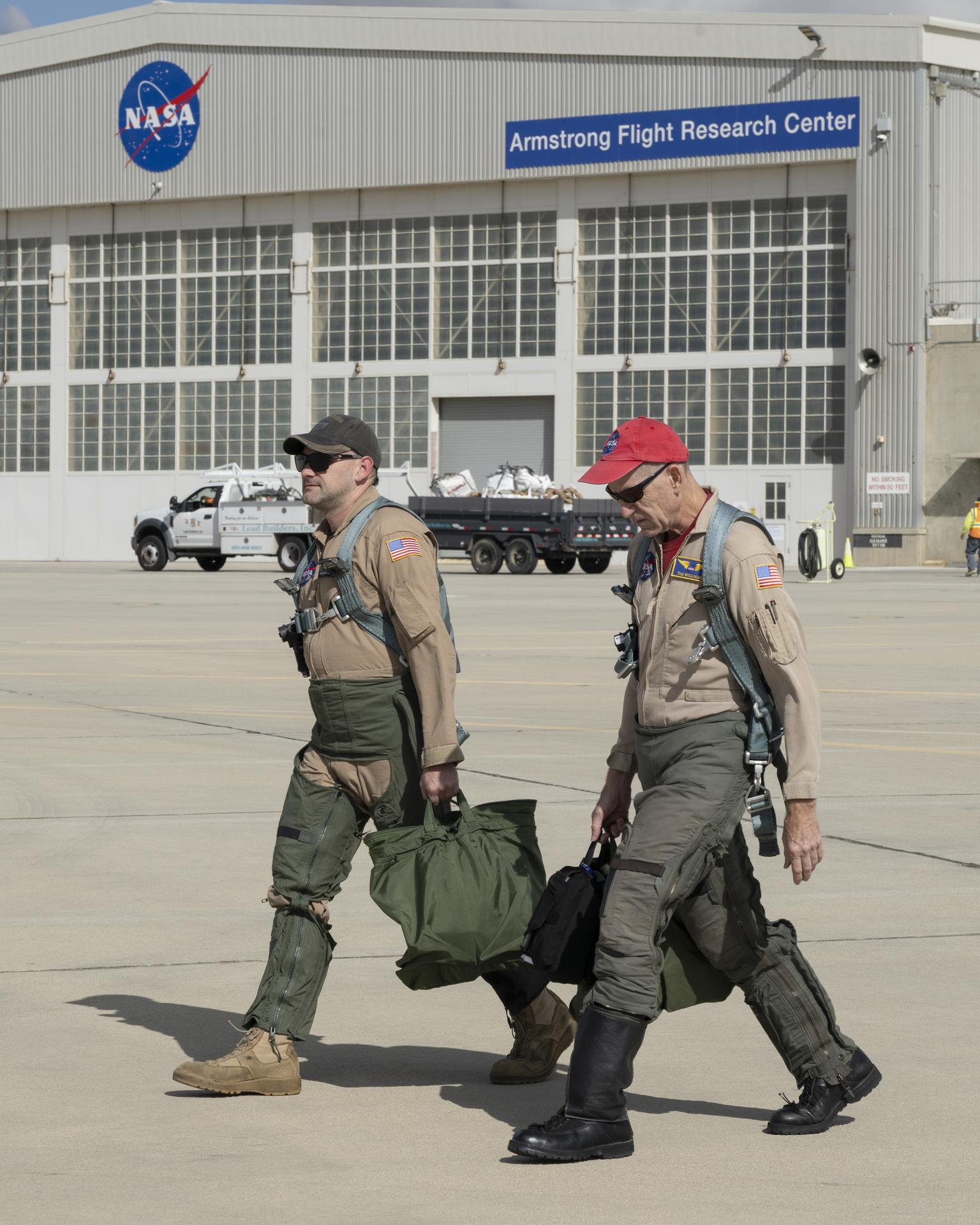 Kelly Jellison, lead avionics technician for NASA’s C-20 and G-V aircraft, and NASA pilot Tim Willaims prepare for an employee incentive flight at NASA’s Armstrong Flight Research Center in Edwards, California, on Wednesday, May 27, 2026. NASA Administrator Jared Isaacman established the ride‑along program to recognize and reward workforce members for their dedication to advancing the agency’s priorities.
