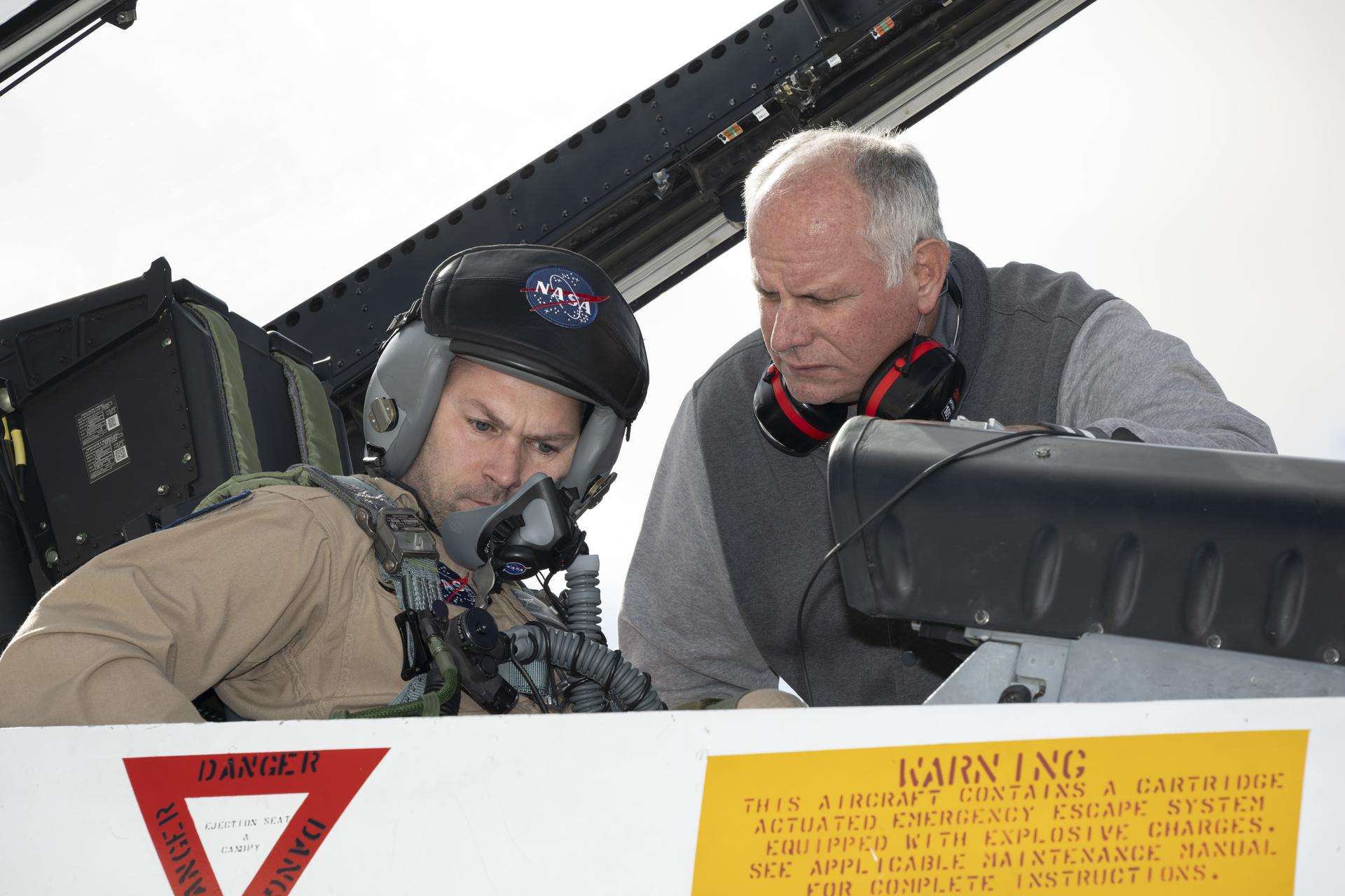 Phil Wellner, aircrew life support technician, help prepare Kelly Jellison, lead avionics technician for NASA’s C-20 and G-V aircraft for an employee incentive flight in an F/A-18 aircraft at NASA’s Armstrong Flight Research Center in Edwards, California, on Wednesday, May 27, 2026. NASA Administrator Jared Isaacman established the ride‑along program to recognize and reward workforce members for their dedication to advancing the agency’s priorities.