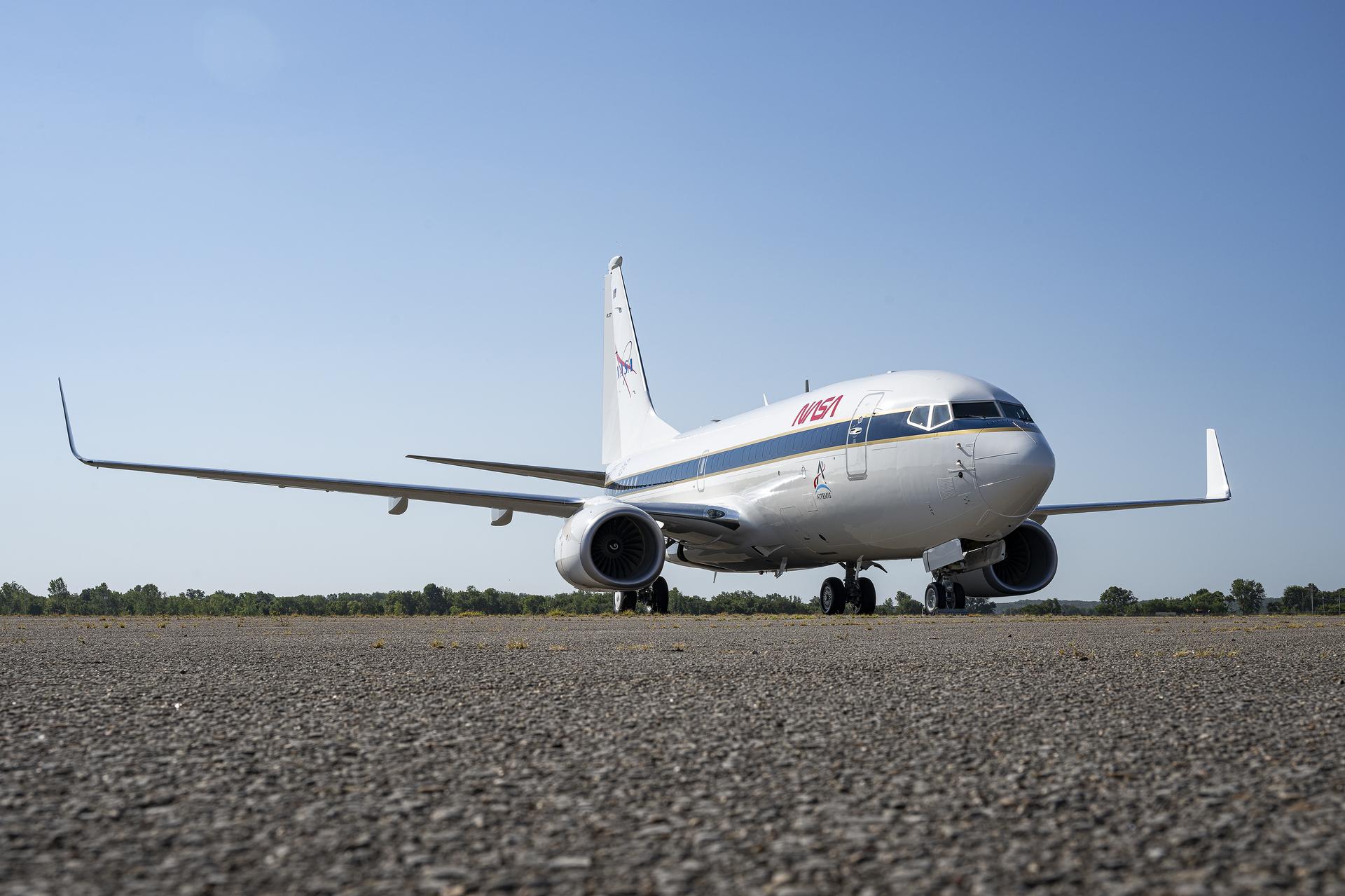 A newly painted NASA 737 aircraft sits on a ramp in Oklahoma on Thursday, Aug. 13, 2026. After modifications, this aircraft will perform lunar-gravity parabolic flights to validate astronaut lunar suits and associated crew systems required to support Artemis mission objectives. Flight testing will happen at NASA’s Johnson Space Center in Houston for reduced-gravity operations, with oversight by NASA’s Armstrong Flight Research Center in Edwards, California. In addition, the aircraft will serve as a key asset for systems‑integration research for flight testing autonomy, sensors, and other digital systems.