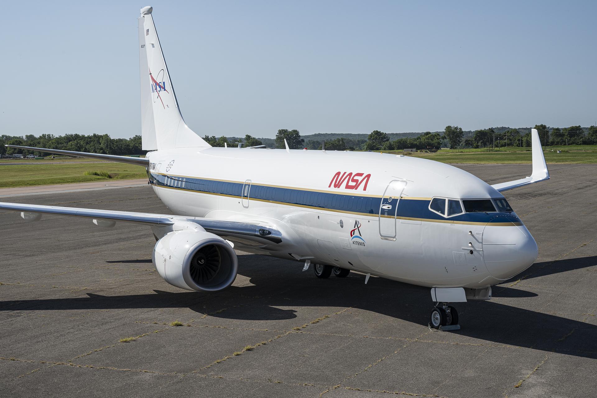 A newly painted NASA 737 aircraft sits on a ramp in Oklahoma on Thursday, Aug. 13, 2026. After modifications, this aircraft will perform lunar-gravity parabolic flights to validate astronaut lunar suits and associated crew systems required to support Artemis mission objectives. Flight testing will happen at NASA’s Johnson Space Center in Houston for reduced-gravity operations, with oversight by NASA’s Armstrong Flight Research Center in Edwards, California. In addition, the aircraft will serve as a key asset for systems‑integration research for flight testing autonomy, sensors, and other digital systems.