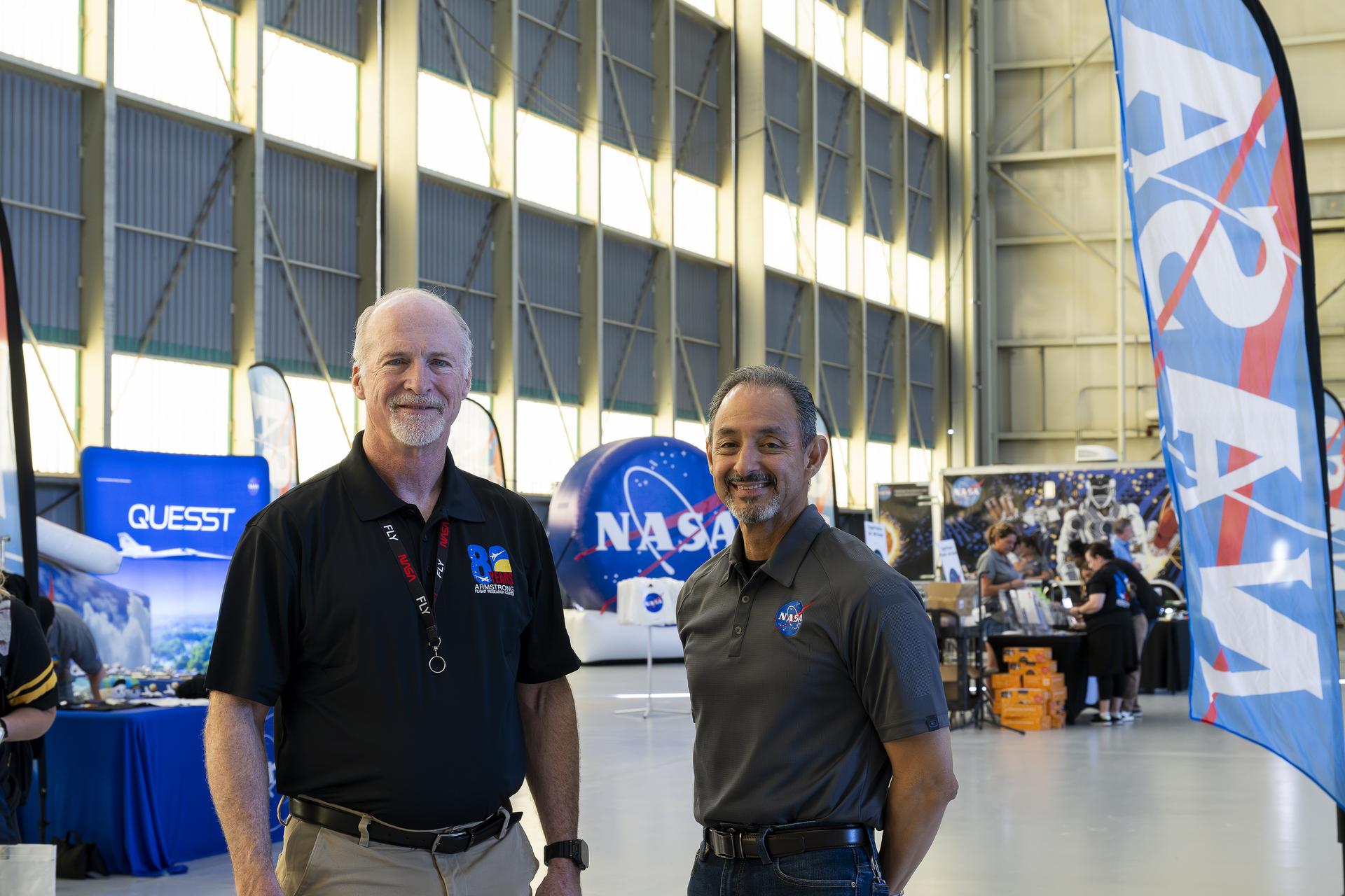 Troy Asher, acting center director at NASA’s Armstrong Flight Research Center in Edwards, California, and Eddie Zavala, acting deputy center director, participate in Red, White, and Boom, the U.S. Air Force Test Center’s celebration of America’s 250th anniversary and NASA Armstrong’s commemoration of its 80th year at Edwards Air Force Base on Friday, Sept. 18, 2026. The event brought together the workforce, families, and the Edwards community for a high‑energy day featuring a Flightline 5K, Ramp Fest and STEM Expo, static aircraft displays, hands‑on STEM activities, and a NASA flyover with a sonic boom.