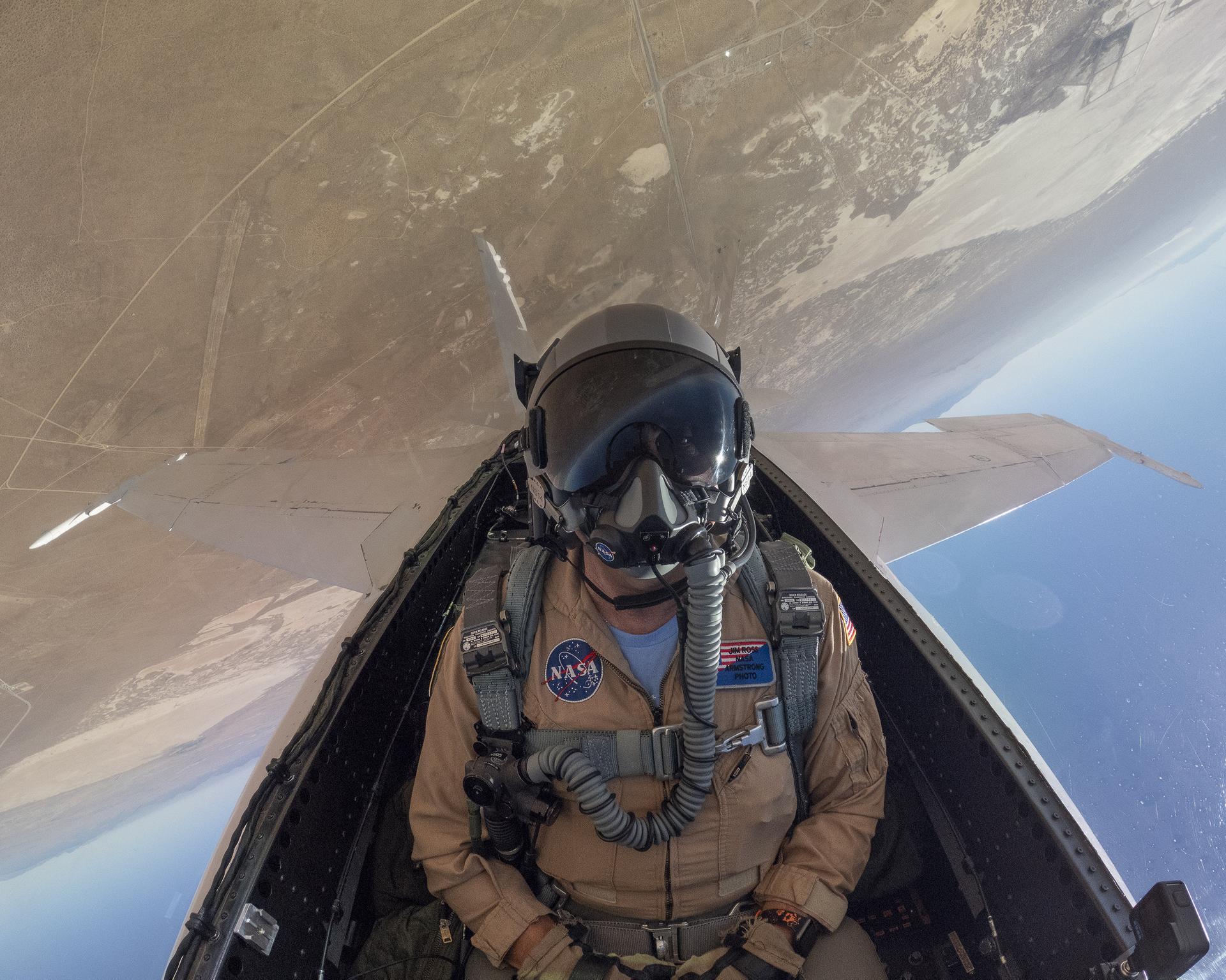 NASA photographer Jim Ross captures a selfie in the rear seat of an F/A-18 during a flyover of the U.S. Air Force Test Center’s Red, White, and Boom celebration of America’s 250th anniversary and NASA Armstrong’s commemoration of its 80th year at Edwards Air Force Base, California, on Friday, Sept. 18, 2026. The event brought together the workforce, families, and the Edwards community for a high‑energy day featuring a Flightline 5K, Ramp Fest and STEM Expo, static aircraft displays, hands‑on STEM activities, and a NASA flyover with a sonic boom.