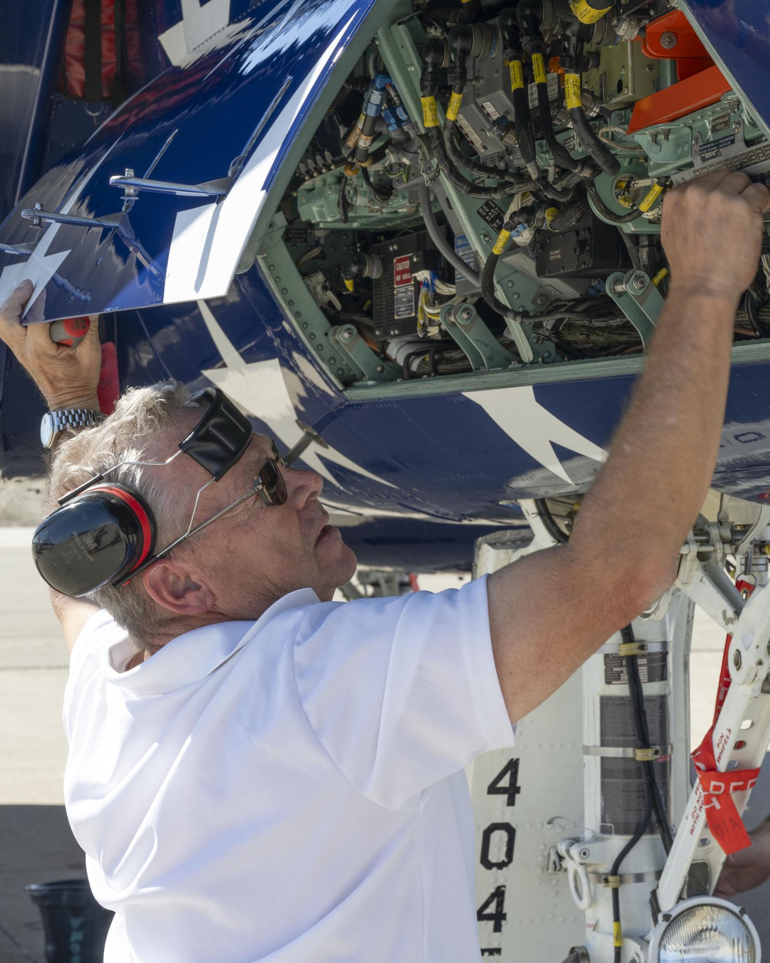 NASA quality assurance specialist Walt Kondracki inspects an agency F-15 aircraft at Los Alamitos Joint Forces Training Base, California, Sunday, Oct. 4, 2026. The jet was among the NASA aircraft that flew in the Pacific Airshow in Huntington Beach, California, Oct. 2-4.