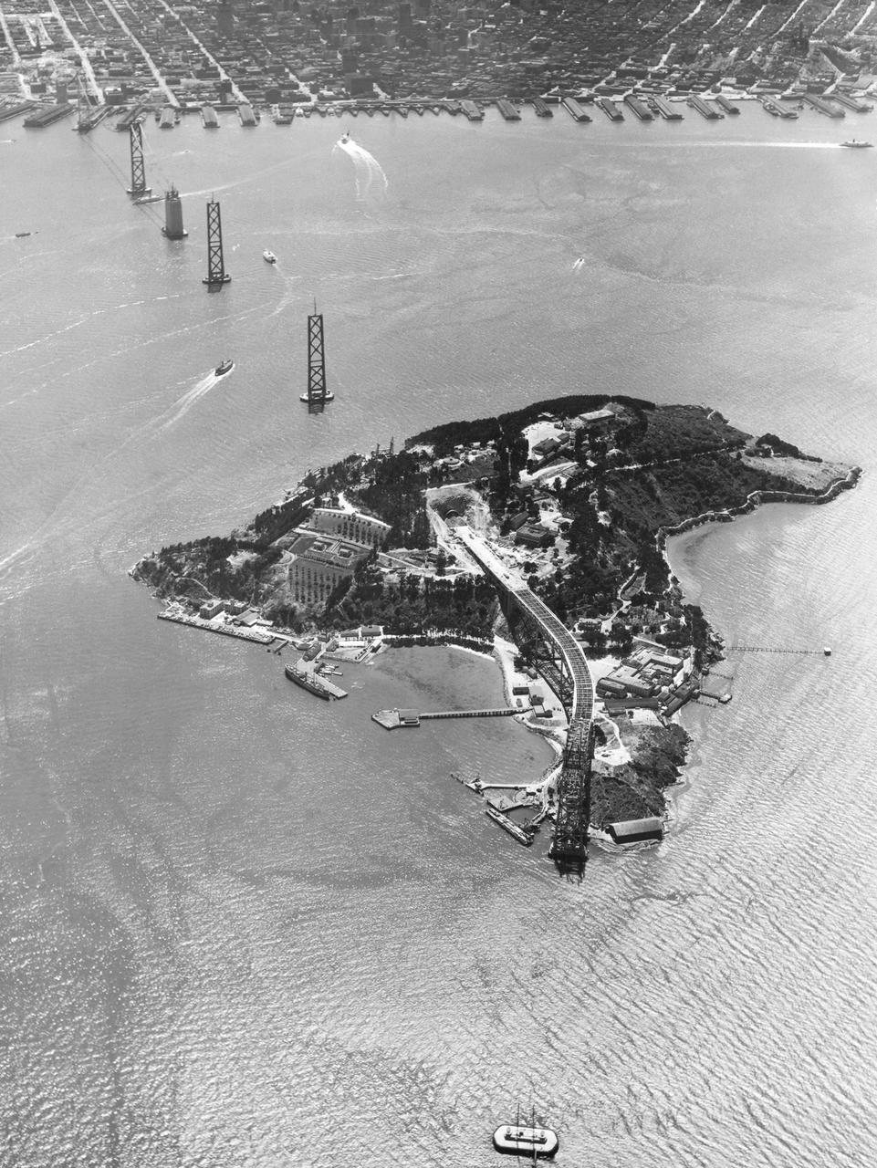 Navy Aerial of San Francisco Bay, California; Yerba Buena Island (Treasure Island) showing construction of San Francisco Bay Bridge