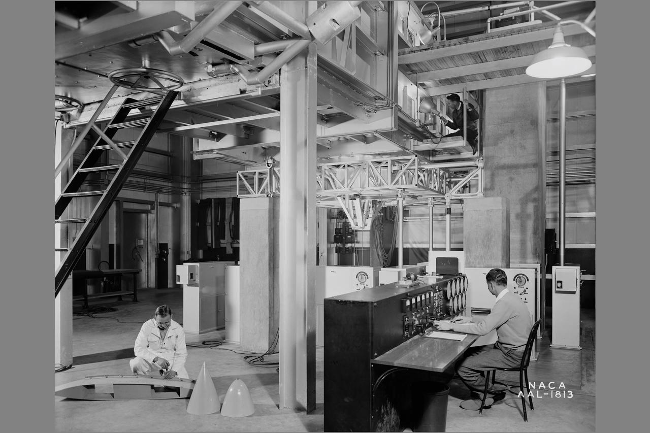 NACA photographer General view test chamber in the 7x10ft wind tunnel at NASA Ames Research center with test engineers