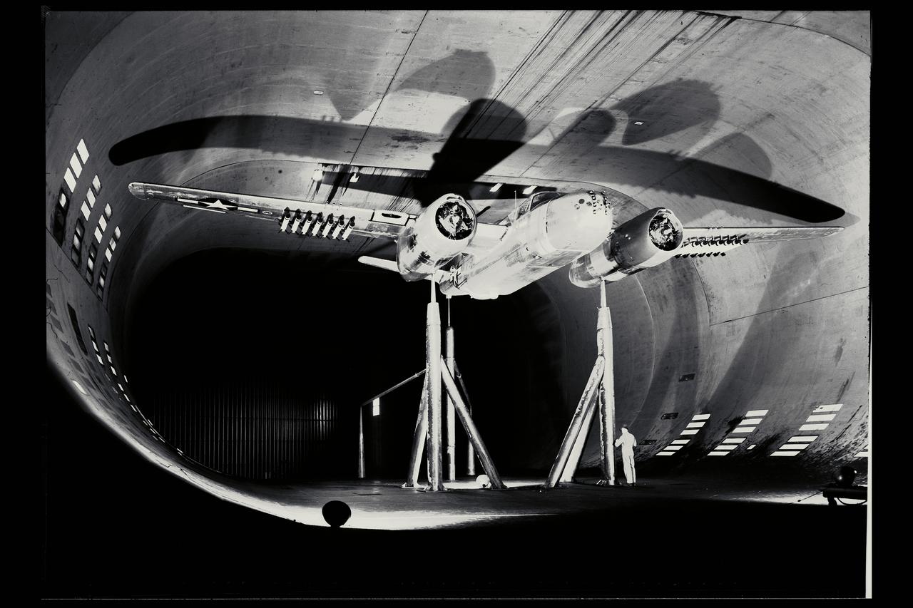 40x80ft wind tunnel testing of a modification to a Douglas A-26B Invader airplane (rockets, bomb and wing)