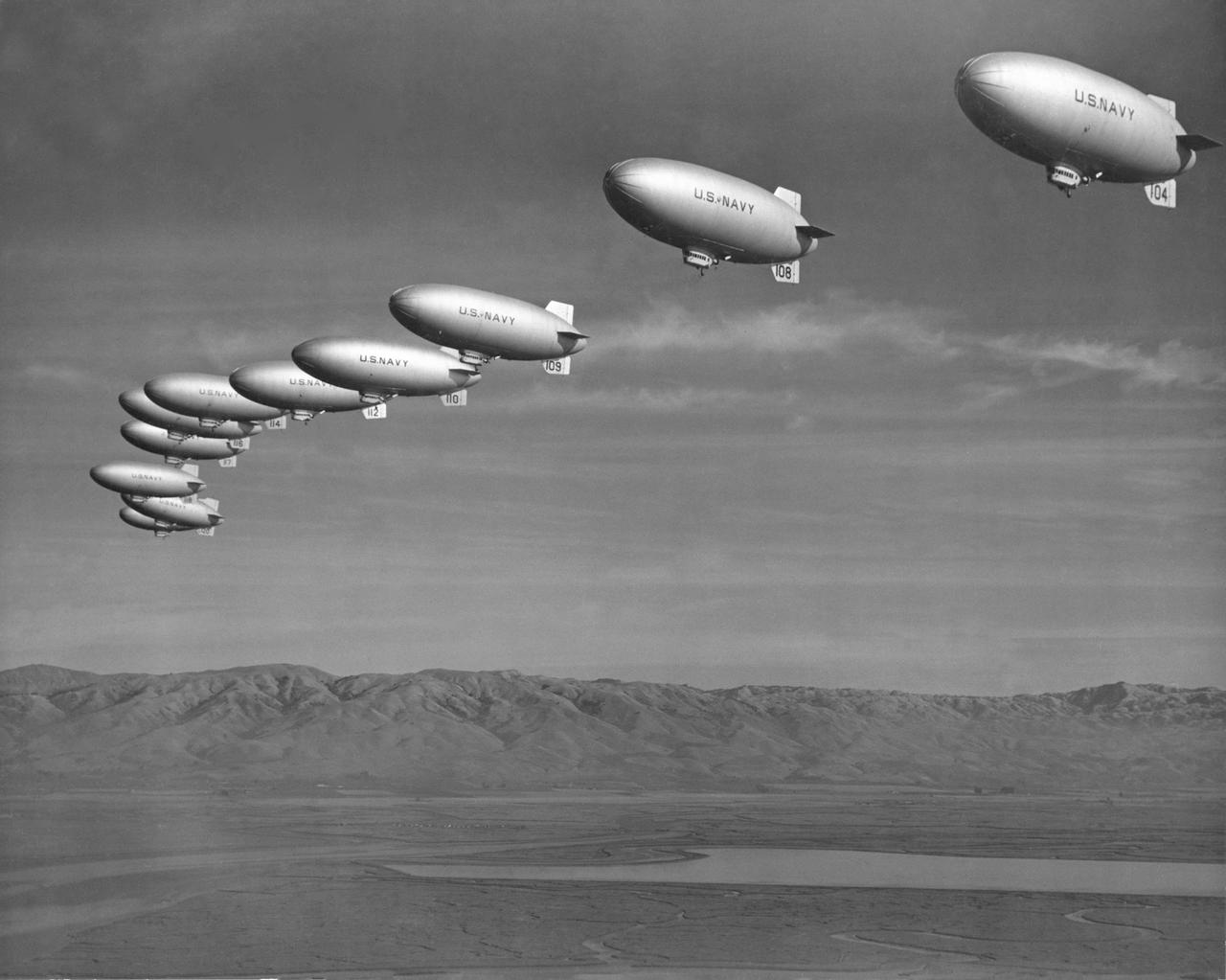 Navy L-Ships in formation (Alt. 600) heading south east lower San Francisco Bay