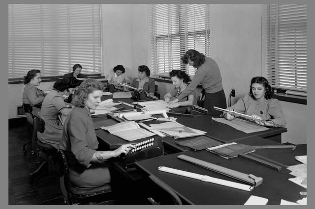 Computers processing data from the 16 Foot Wind Tunnel at Ames Research Center.