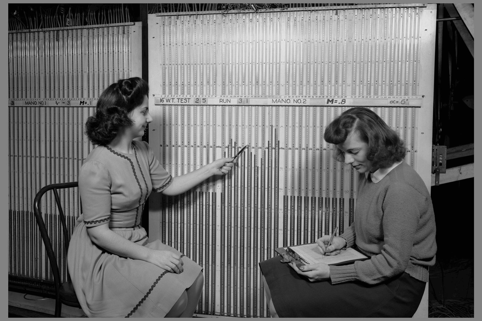 AAL-4962. Computers reading from the Manometer Board of the 16 Foot Wind Tunnel.