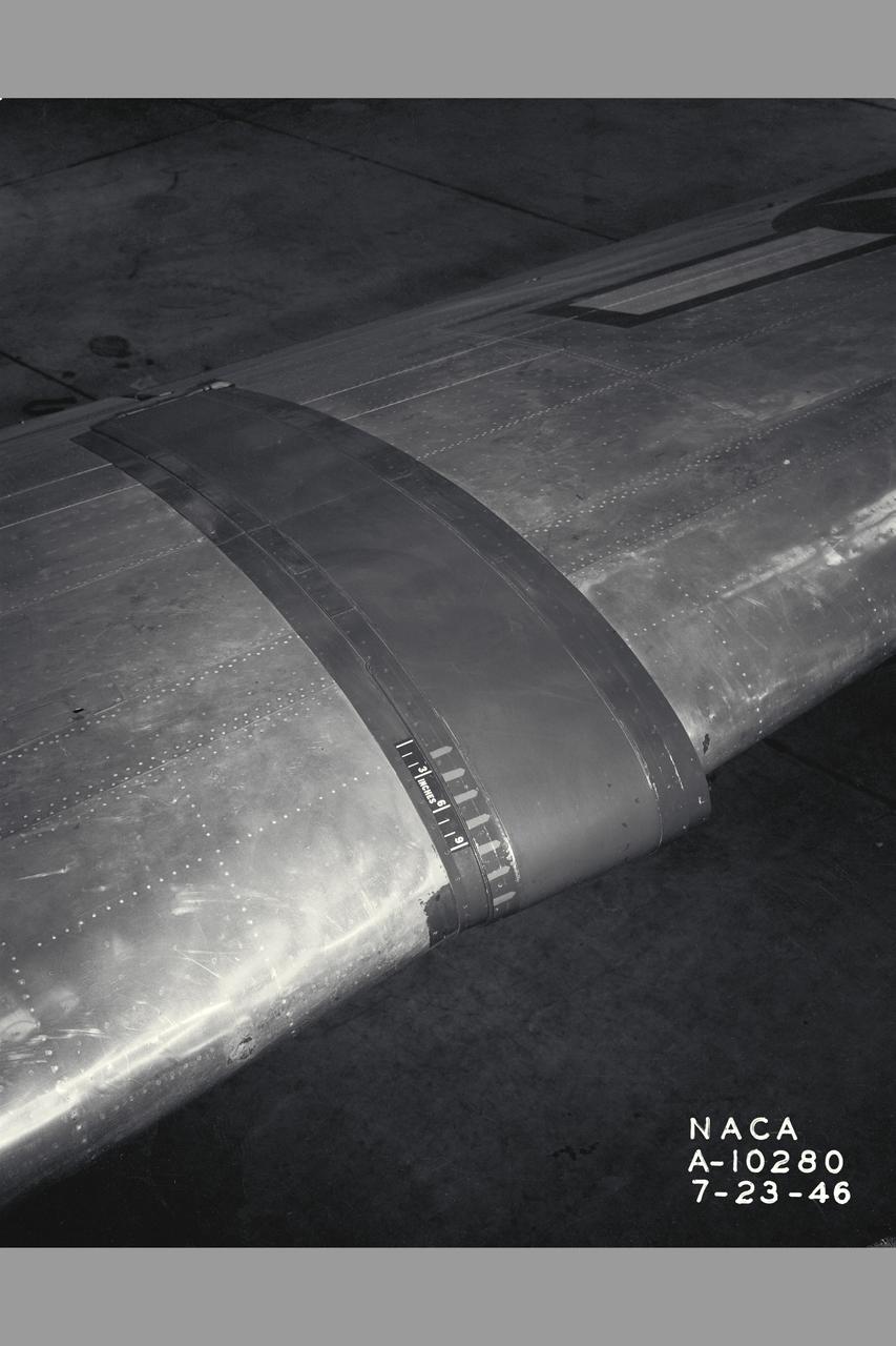 NACA Photographer Electrically heated airfoil - wing glove on C-46 airplane